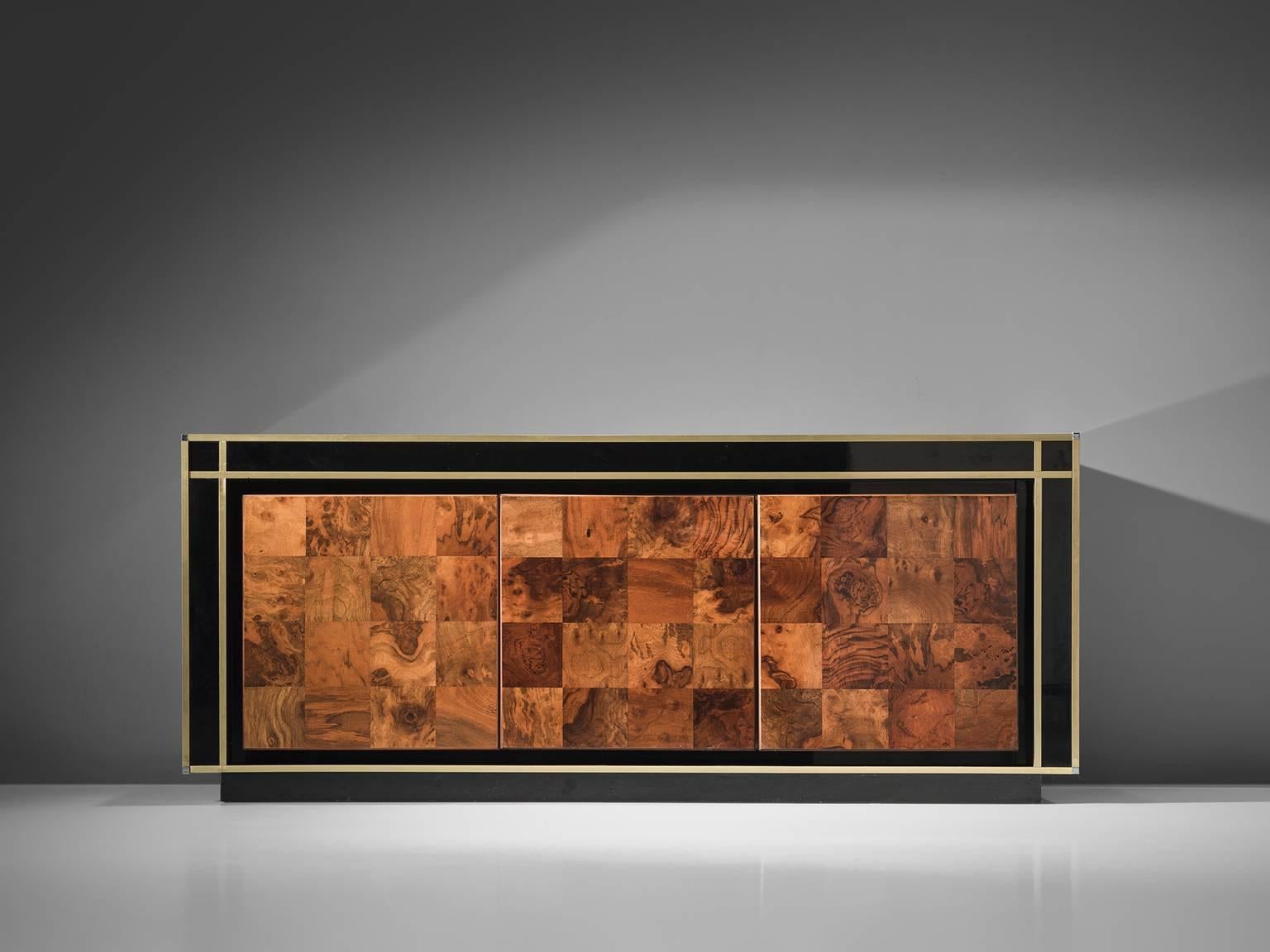 Credenza, burl, formica, brass, France, 1950s.

The doors of this sideboard are made form square piece of walnut burl wood showing an interesting pattern due to the several facets of inlayed veneered, finished with a nice deep lacquer. The piece
