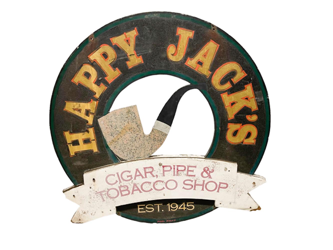 Two-sided tobacconist trade sign of circular form with gold leaf lettering with red shadow on a black sand paint ground with green borders 
