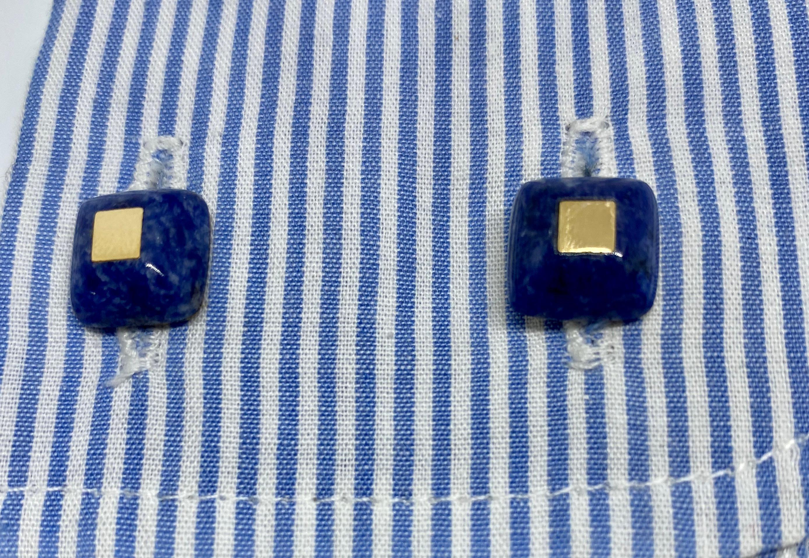 These charming cufflinks feature four sugarloaf-cut lapis squares with rounded edges, inset with 14K yellow gold squares and set in sterling silver vermeil. They were made by A&Z Hayward, a jeweler established 1851, and date from the first half of