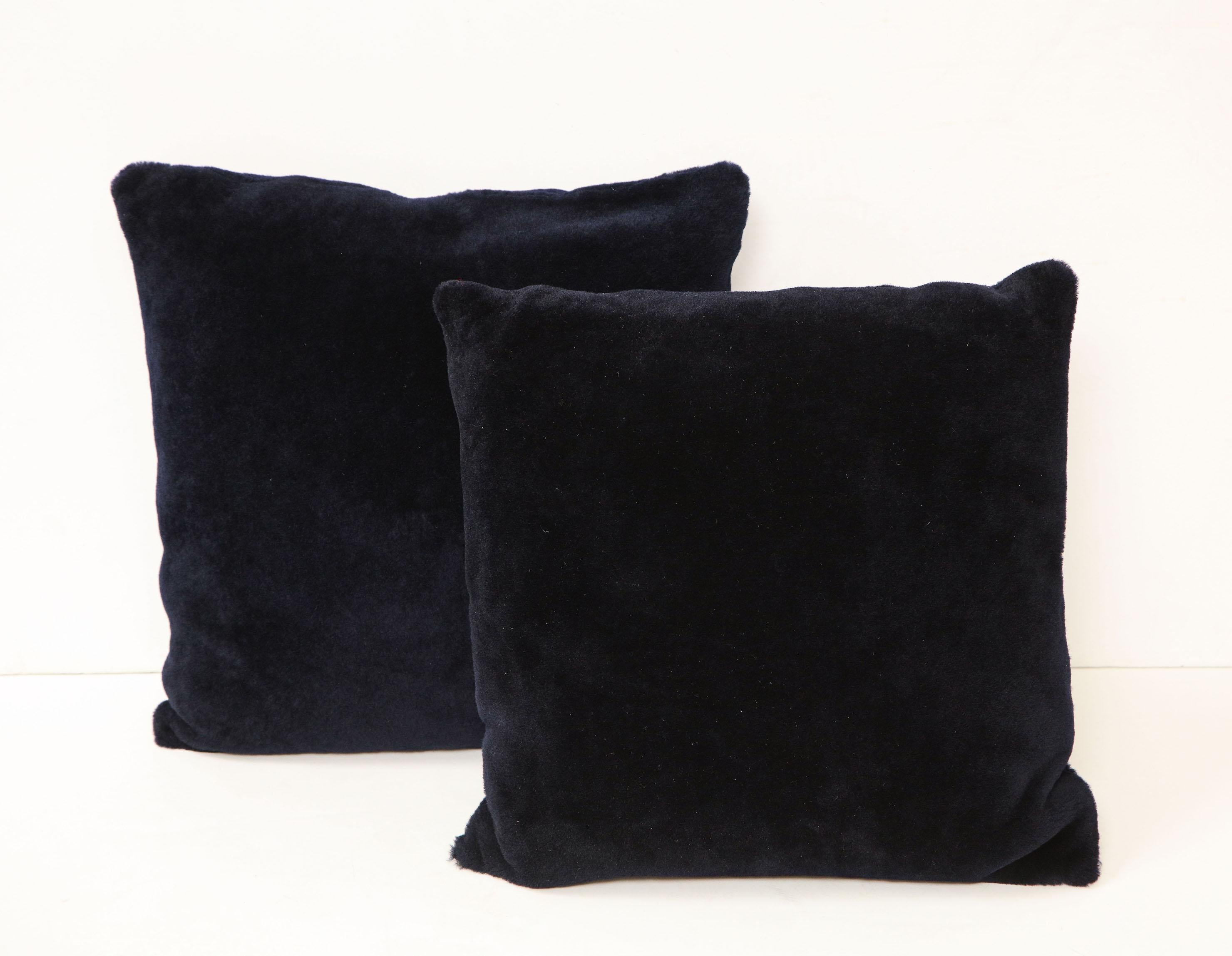 Double sided Merino short hair shearling pillow in midnight blue color. Beautiful accessory piece with rich and deep color. It is made of genuine shearing with a zipper enclosure in a matching color, filled with down and feather, and 18