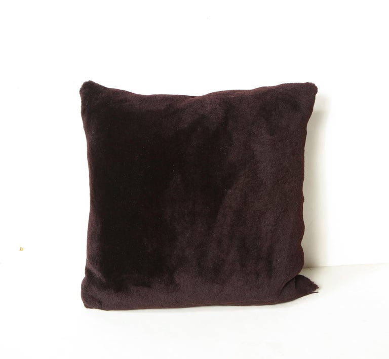 Double sided Merino short hair shearling pillow in deep plum color. The pillow is made of genuine shearing with a zipper enclosure in a matching color. Custom order are available for different sizes and colors. Due to the nature of genuine product,