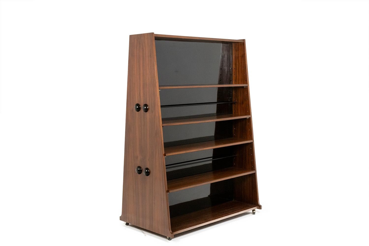 Italian “Double-sided” rosewood bookcase on casters. Circa 1960. LS58761008H For Sale