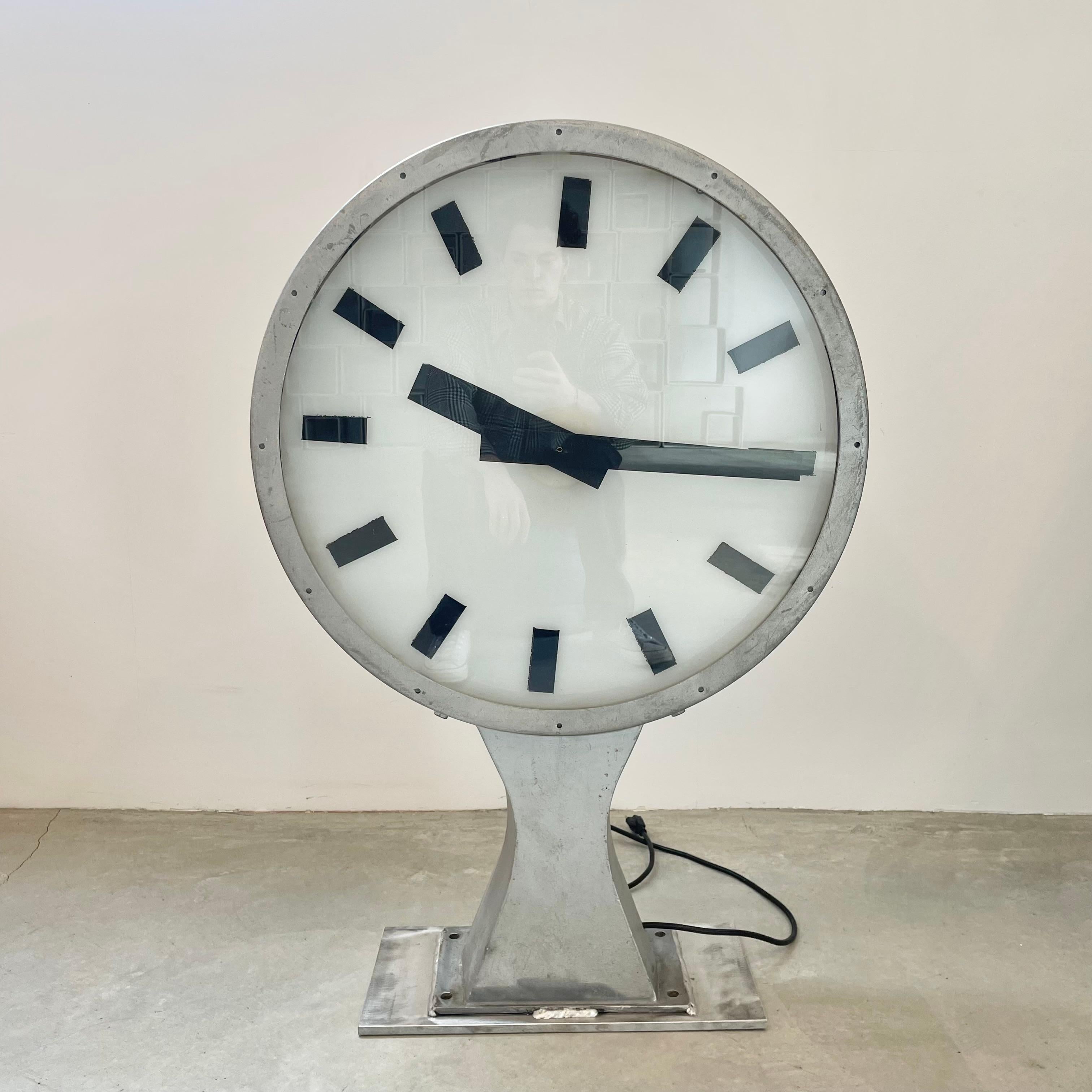 Fantastic double-sided illuminated railway station clock from Denmark circa 1960s. Each side can be set to a different time/ time-zone. Quintessential Scandinavian minimalist design. Fully functioning, working clock with new motors and internal