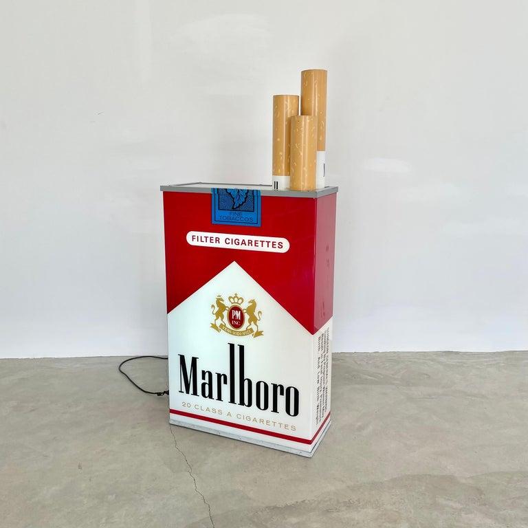 Very cool vintage advertising light up box by Marlboro. A relic of 90's commercial culture. Massive scale. Double sided. Fantastic condition with very little wear as shown. Looks great hanging on the wall or on the ground. Acrylic sides and