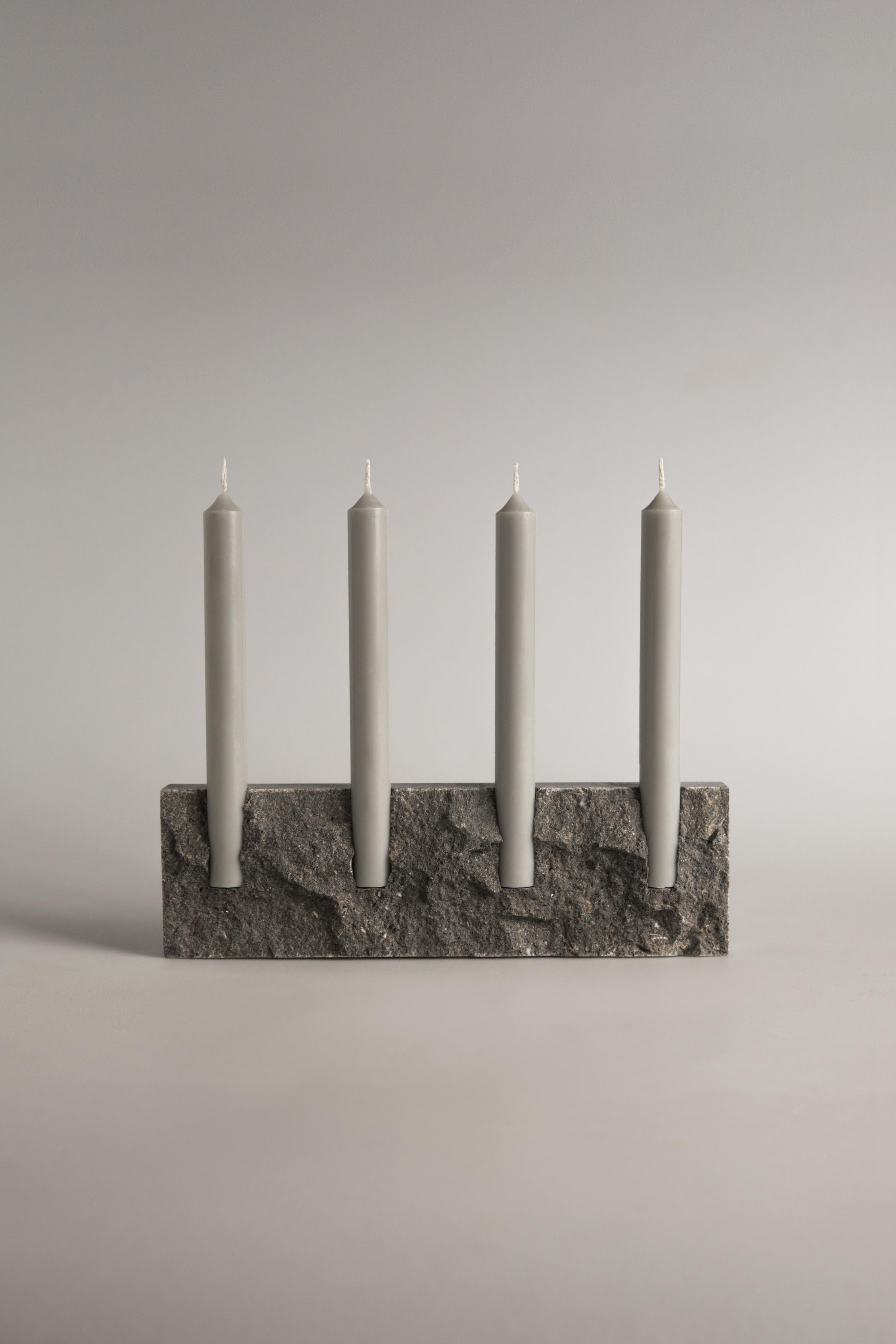 Handcrafted candle holder Sant Vicenç natural stone with rock face front (hand chipped) and smooth sides. Please note that each stone is unique and reacts differently, therefore important variations in colour, shape and texture occur. 

Snug