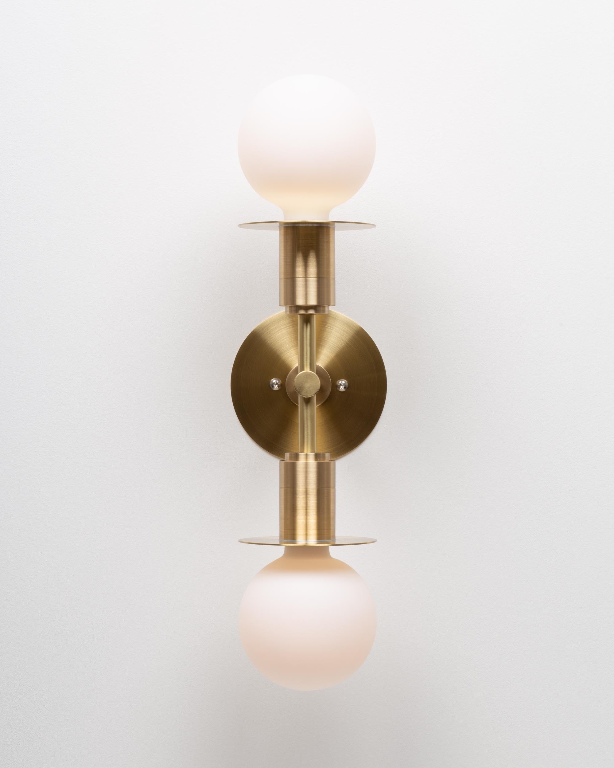 Double Sphere Disc Wall Light 
Brushed brass wall plate
2000K - 2800K  95CRI
1200 Dim to Warm Lumens 
Flush mount Hard Wired
Sphere III Bulbs Included
Handmade in Hackney Wick, by Lights of London.
