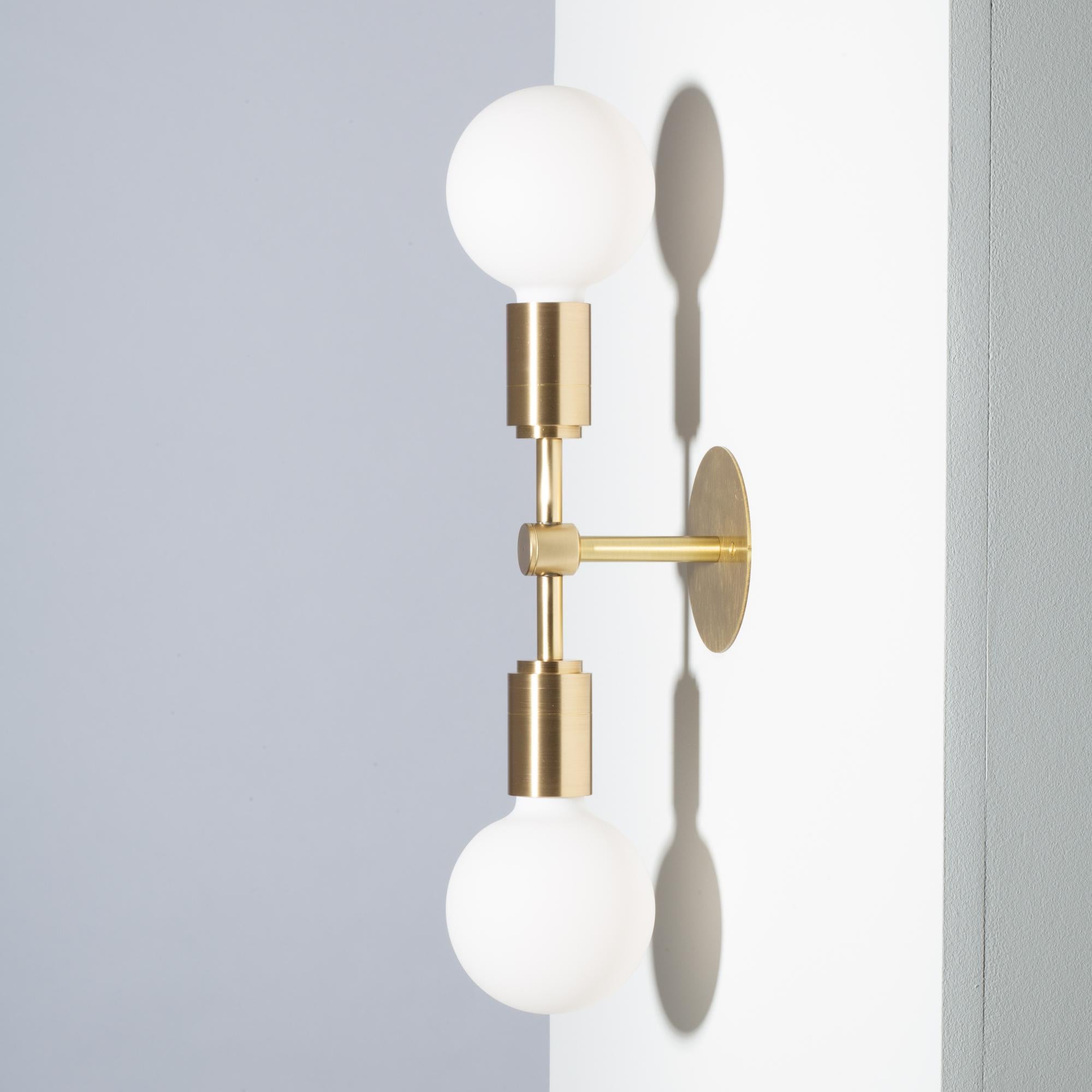 Double Sphere III Wall Light 
Brushed Brass Wall Plate 
2000K - 2800K  95CRI
1200 Dim to Warm Lumens 
Flush mount or Surface mount. 
Plug in Dimmable wired available on request. 
Sphere III Bulbs Included
Custom Finishes and options Available on