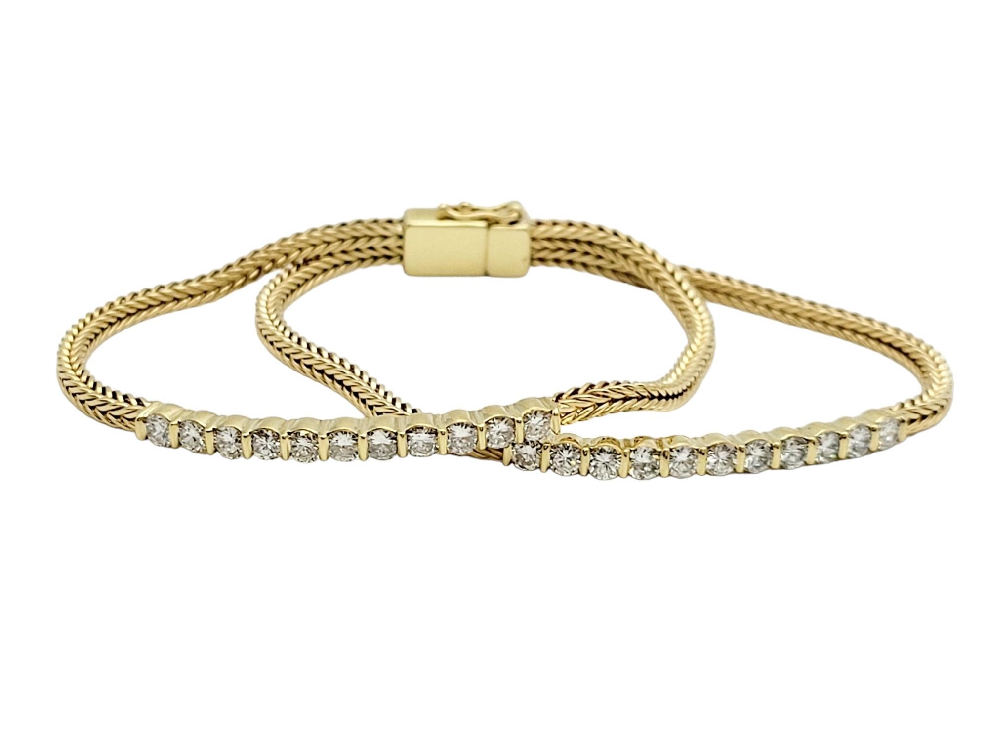 This exquisite diamond and gold bracelet stands as a testament to opulence and refined craftsmanship. Fashioned from lustrous 18 karat gold, the bracelet features a captivating design that effortlessly marries the timeless elegance of diamonds with