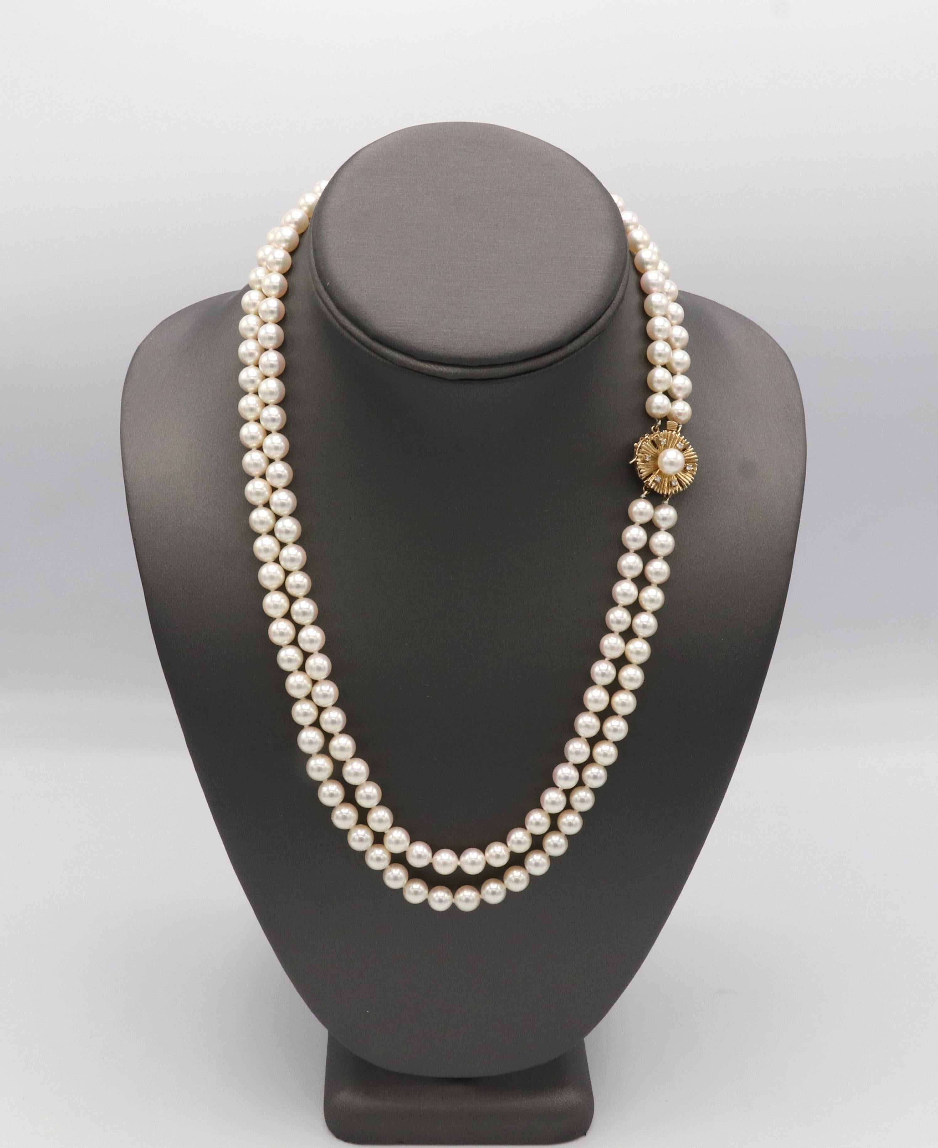 Double Strand 7mm Cultured Pearl Necklace With Natural Diamond & Gold Clasp 
Metal: 14k yellow gold
Weight: 64.3 grams
Pearls: 7mm, 2 rows, white with creamy luster
Diamonds: .06 CTW G-H VS round natural diamonds
Clasp: 17m
Length: 20 inch