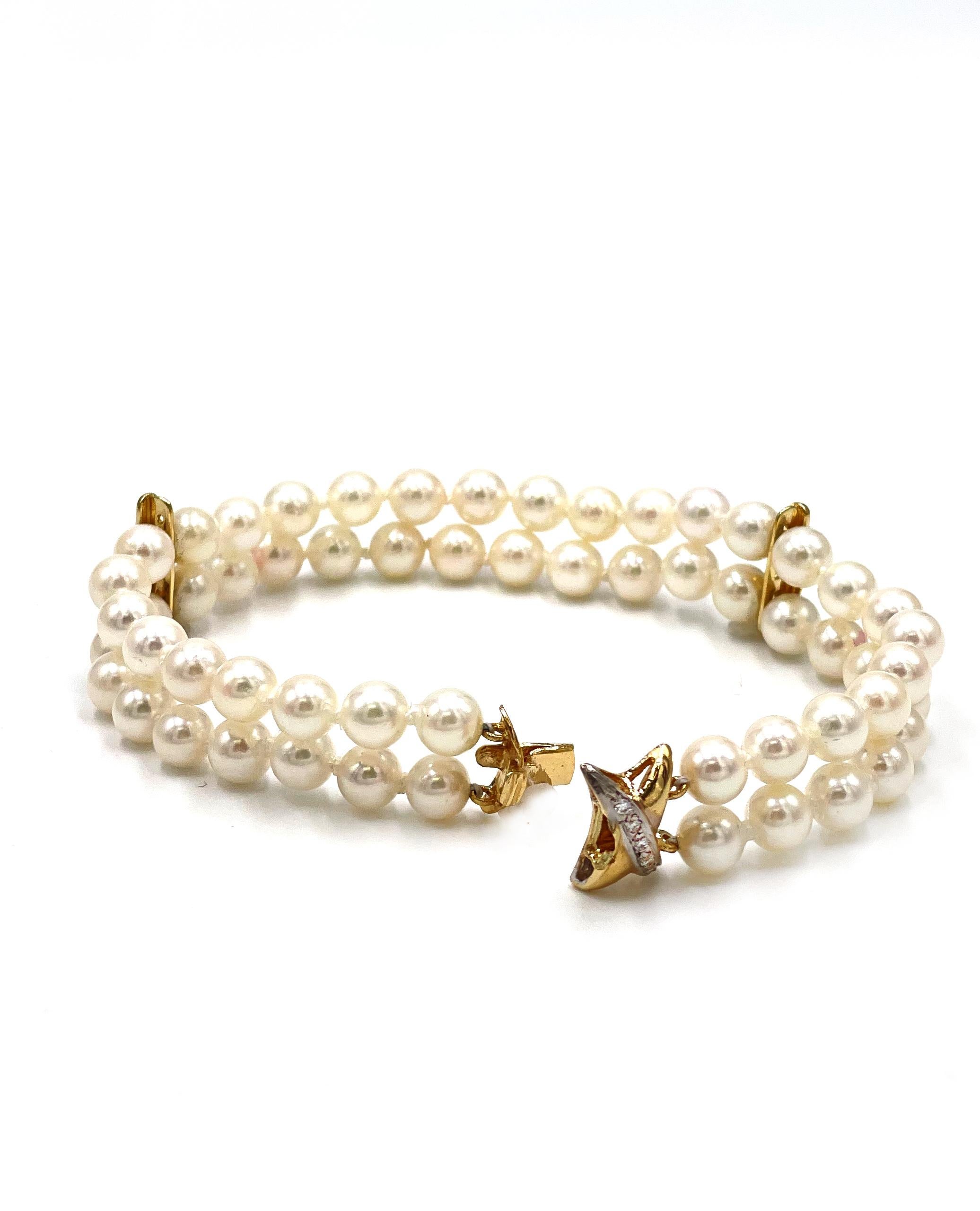 Bracelet à double rang de perles de culture avec entretoises en or jaune 14k et fermoir en forme de 