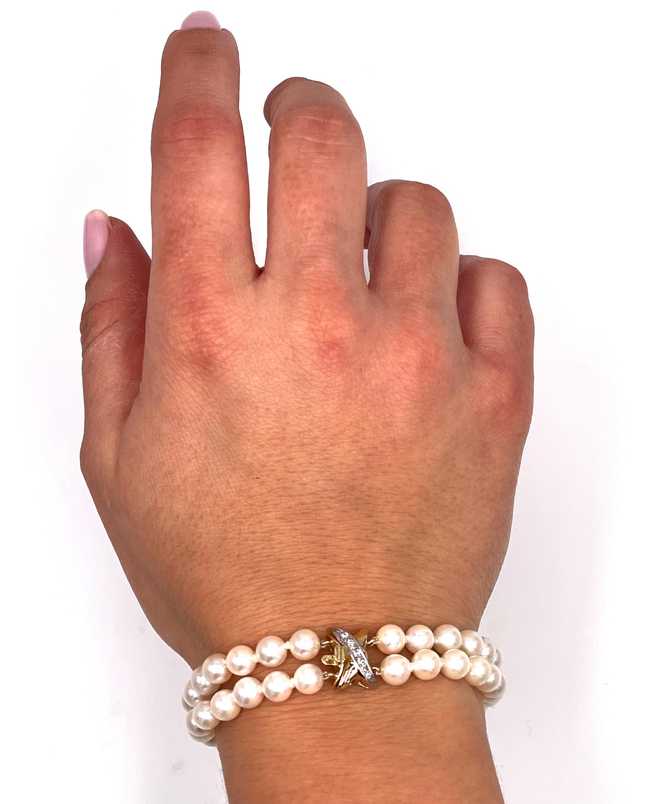 Contemporary Double Strand Cultured Pearl Bracelet with 14K Yellow Gold X Clasp with Diamonds For Sale