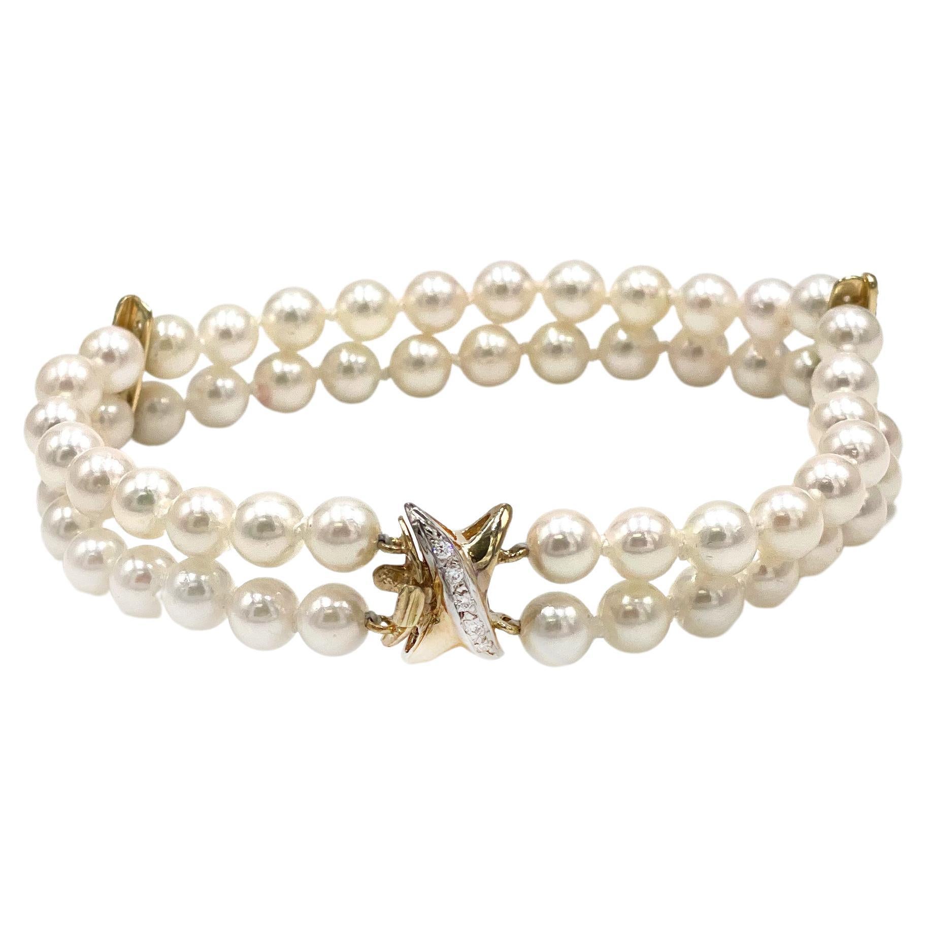 Bracelet de perles de culture à double rang avec fermoir en forme de X en or jaune 14 carats avec diamants en vente