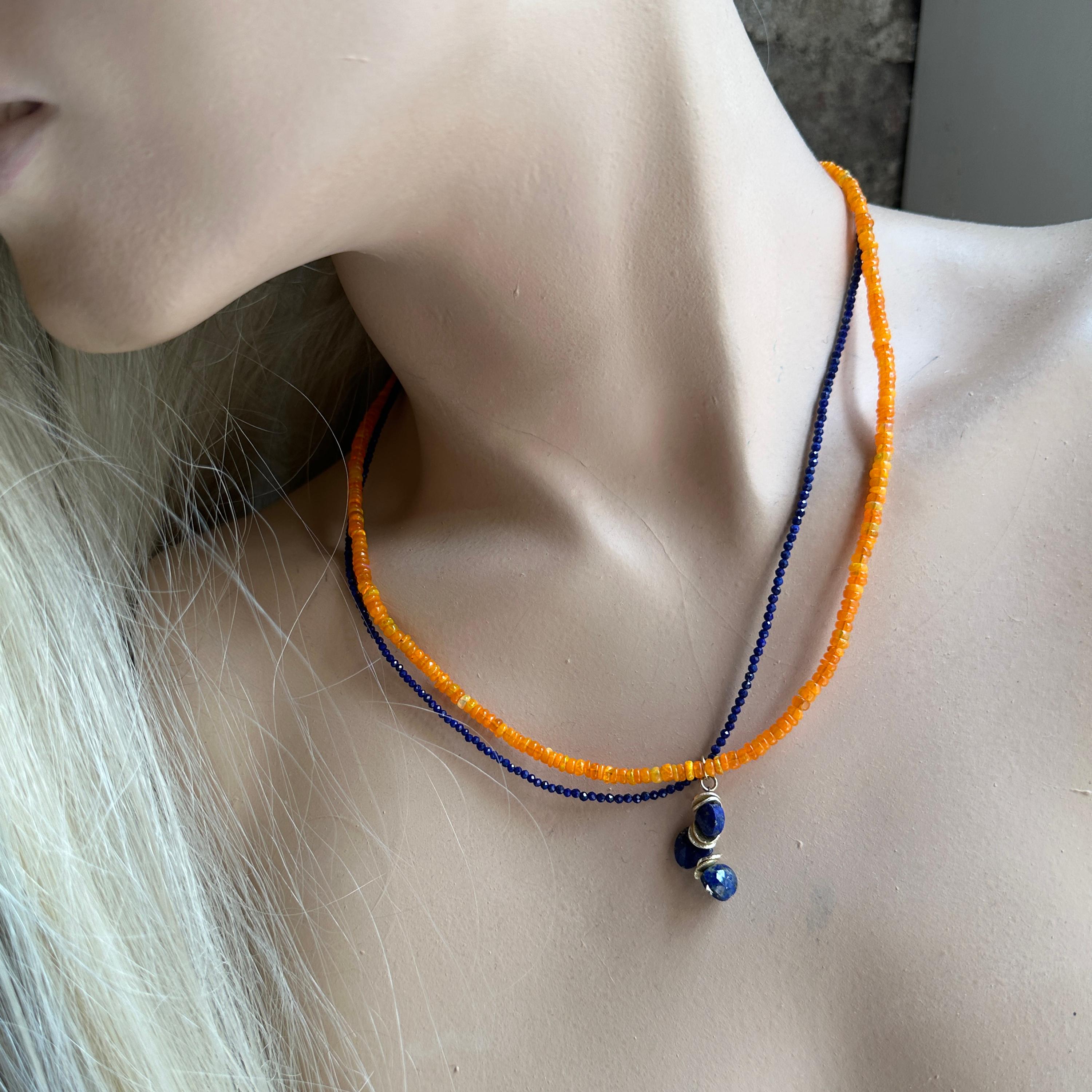  Featuring a double strand of stunning small lapis beads paired with brilliant bright orange opal rondels, this exquisite necklace is finished with a 14K gold filled lobster clasp and a delightful 1