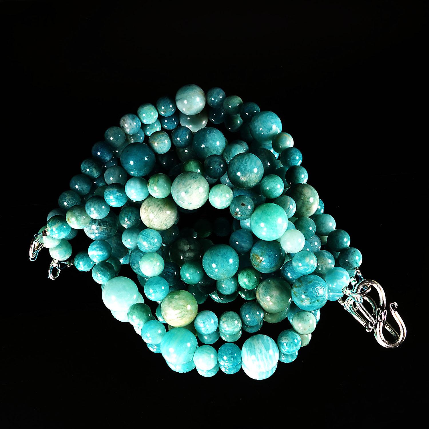 Elegant double strand necklace of highly polished Amazonite.  This gorgeous necklace features two sizes of Amazonite in a lovely design, 12MM and 8MM.  The 20 inch Amazonite necklace is secured with a silver tone hook and eye clasp.

Amazonite is a