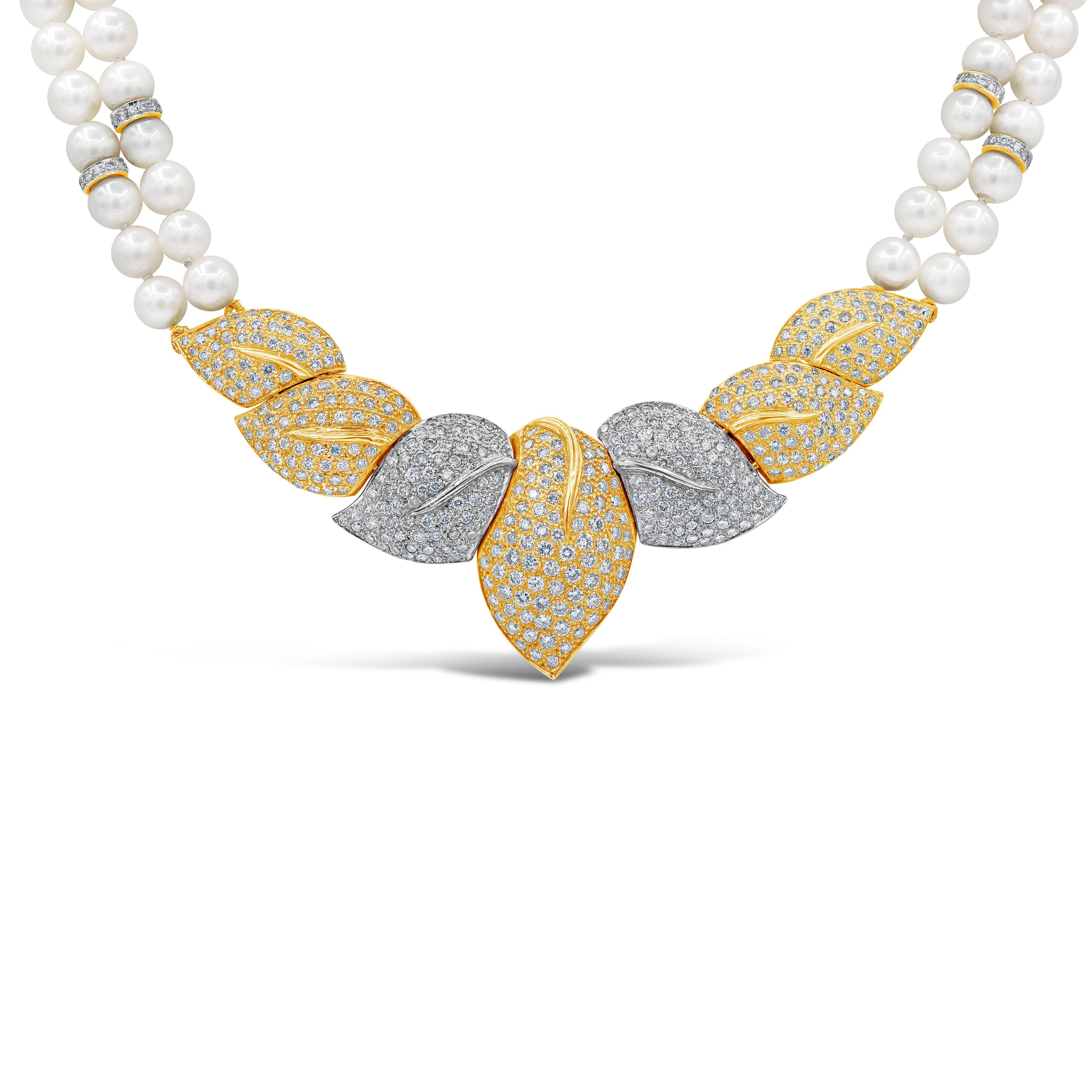 Showcasing intricately-designed leaves encrusted with diamonds, suspended on two strands of 6.10-6.50 millimeter pearls. Diamonds weigh 14.30 carats total. Made in 18 karat gold.

Roman Malakov is a custom house, specializing in creating anything
