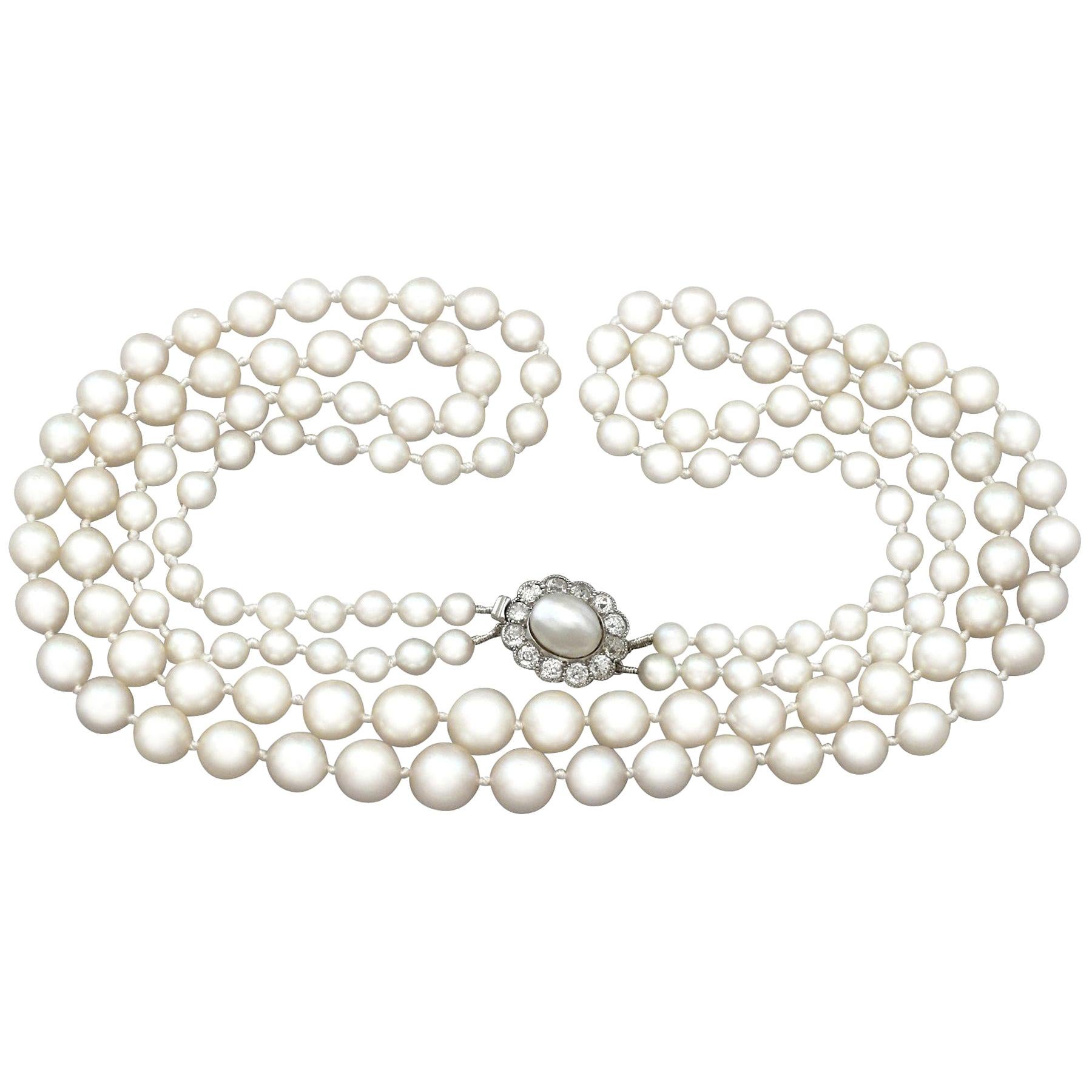 Collana a doppio filo con perle e diamanti in oro giallo