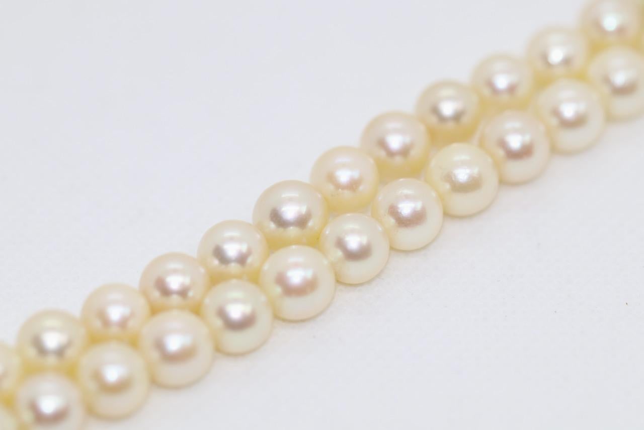 Double Strand Pearl Necklace with 18 Karat Gold Clasp and Diamonds 2