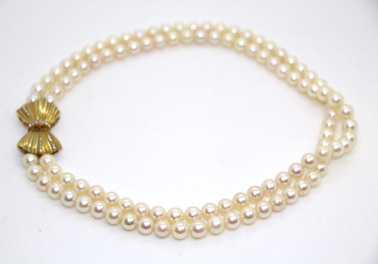 Women's Double Strand Pearl Necklace with 18 Karat Gold Clasp and Diamonds