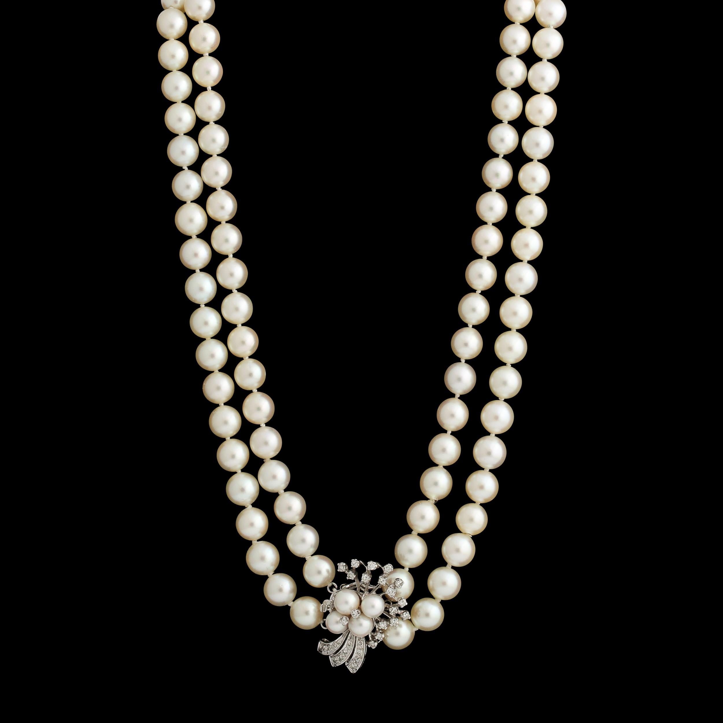 Post-War Double Strand Pearl Necklace with A White Gold , Diamond & Pearl Clasp For Sale
