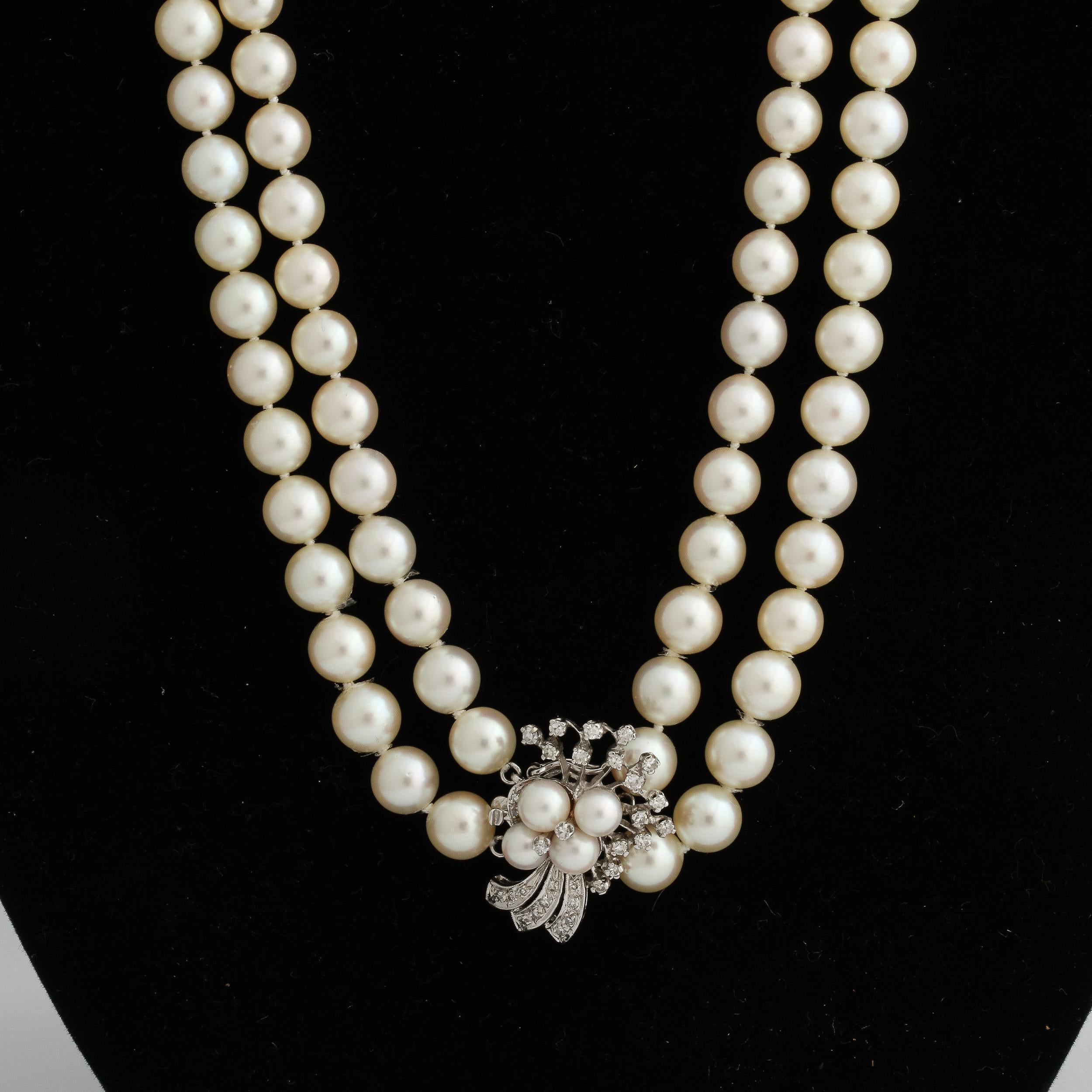 Double Strand Pearl Necklace with A White Gold , Diamond & Pearl Clasp In Excellent Condition For Sale In New York, NY