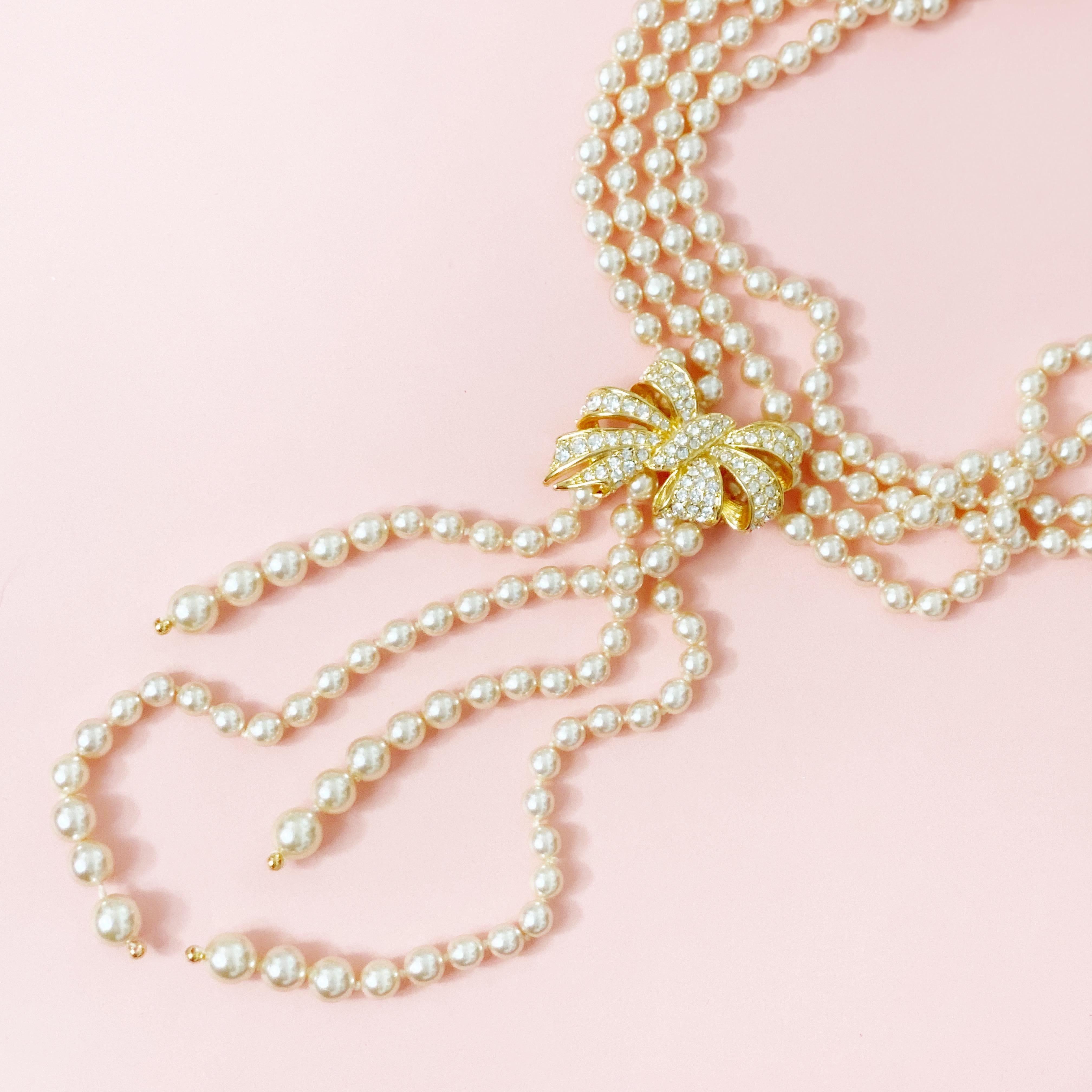 double strand pearl necklace with brooch