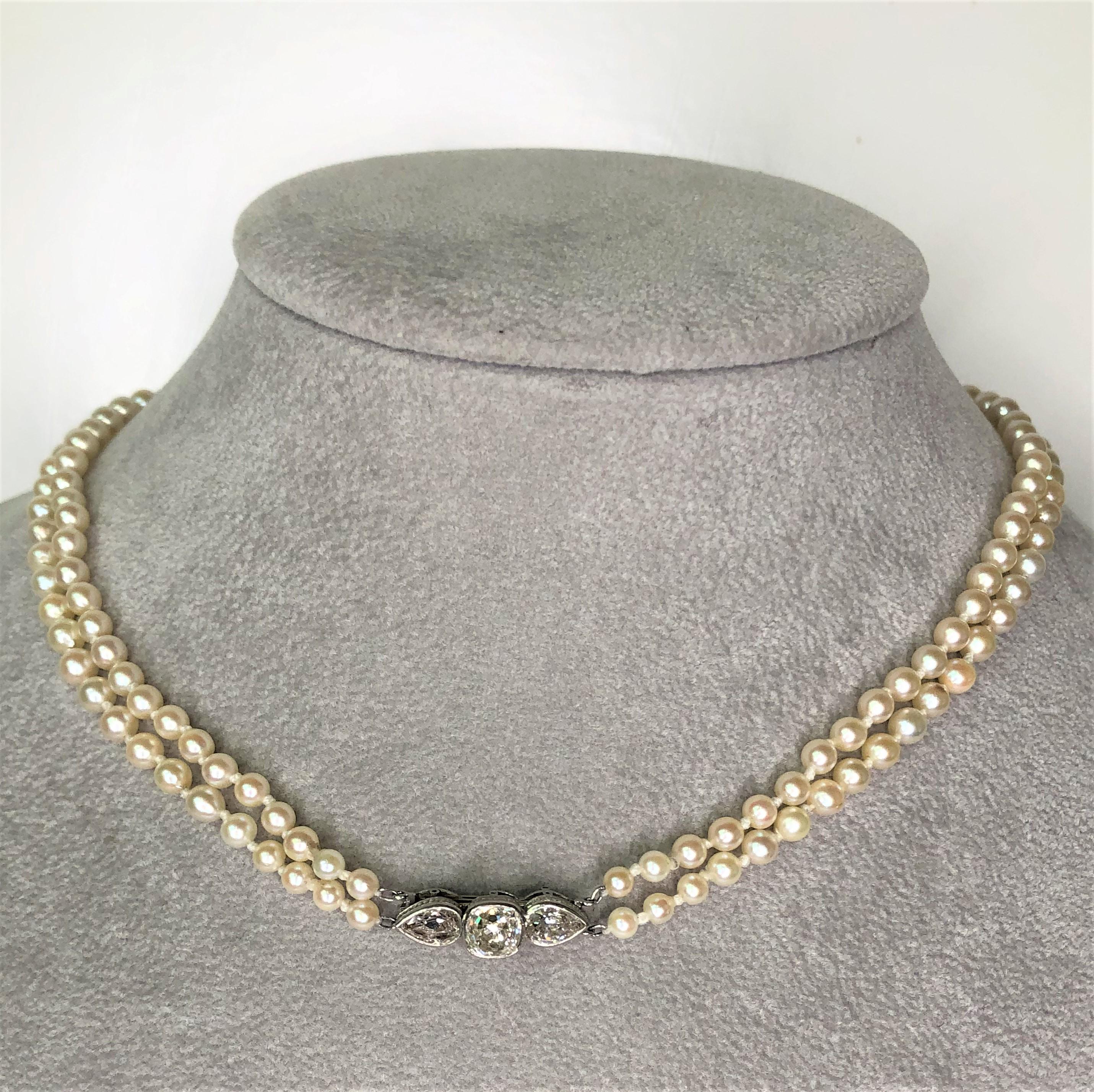 This amazing necklace is unique; with beautiful shiny diamonds and two strands of round pearls, it's a must have for anyone!
Two graduated, cultured pearl strands with diamond clasp, approximately 16 inches total length.
Knots between each