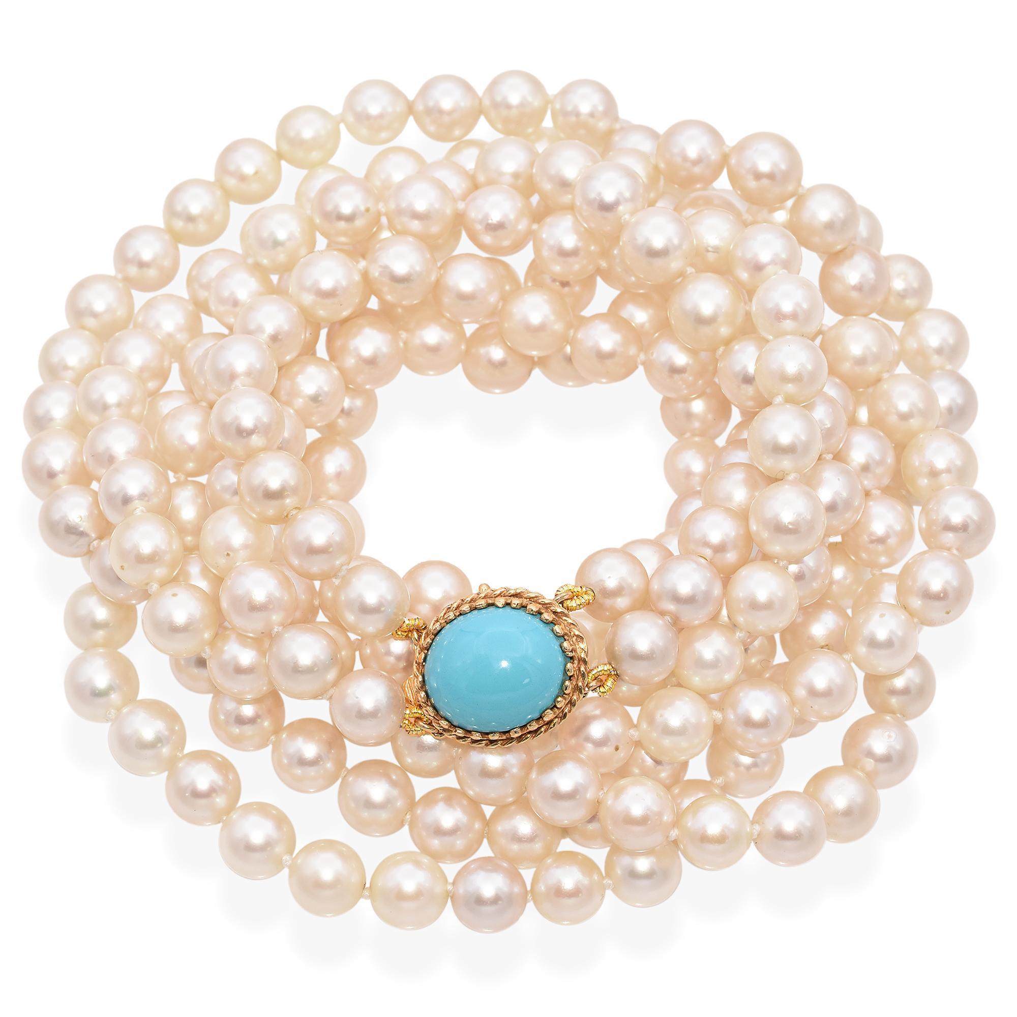 This exquisite piece features two strands of lustrous white pearls. The necklace is accentuated by a striking blue turquoise cabochon clasp, weighing 0.3 carats.

Weight: 11.92 grams 
Stone: Akoya Cultured Pearl 7mm-7.5mm; 6.6ct Turquoise Cabochon.