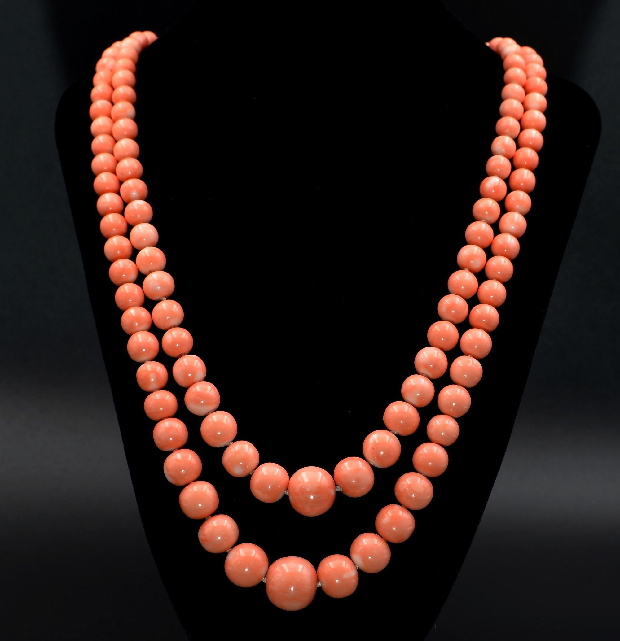 Coral Appeal
This truly enchanting double strand Coral necklace is 1970 ca, comes with its original certification from an Italian jeweller, dated
The necklace is composed by a double strand of 100% natural untreated Coral round beads, the most