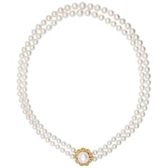 0.40 Carats Brilliant Round Diamond and Double Strand Pearl Necklace