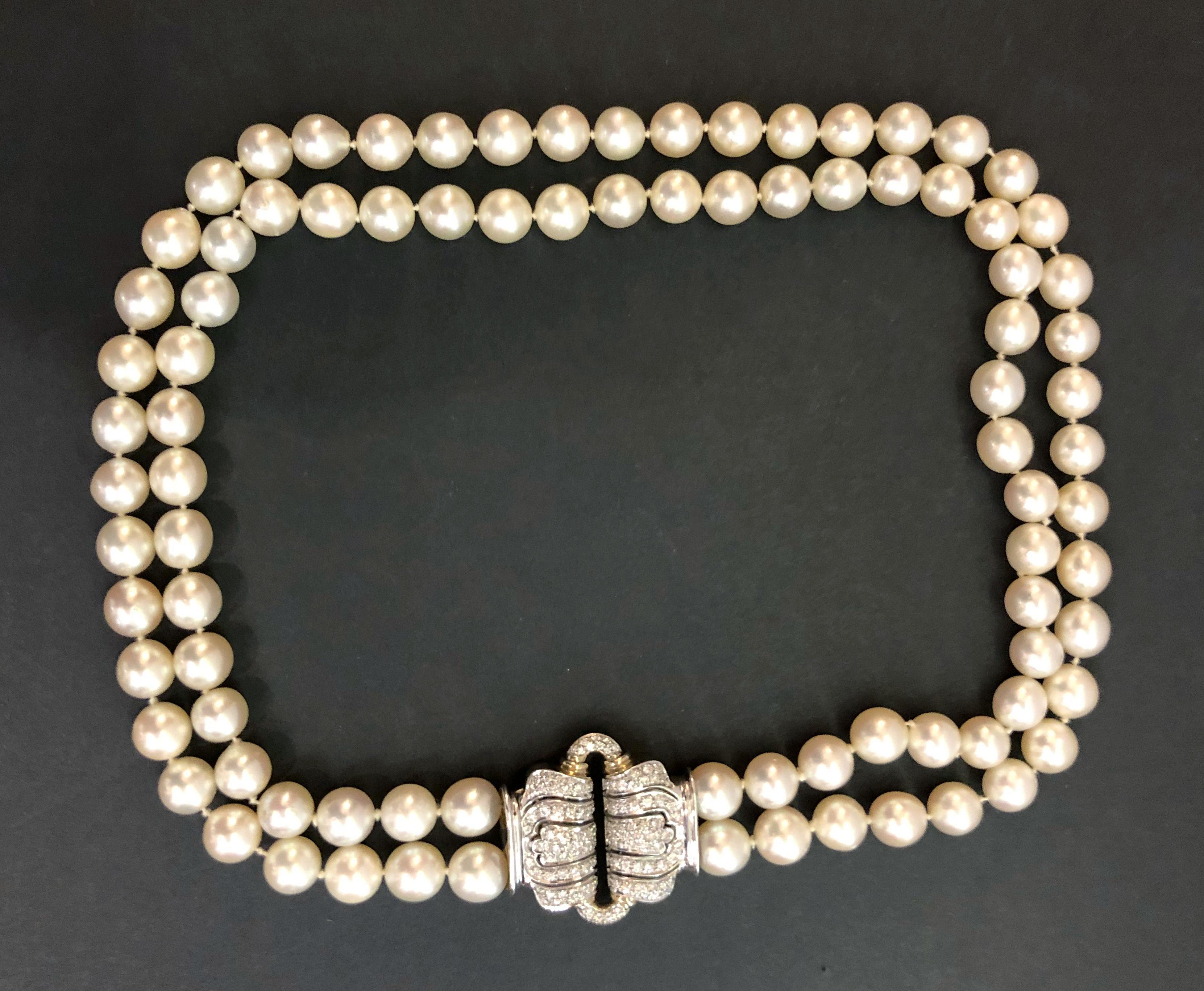 Vintage necklace with double strands of 9.5mm pearls, and white and yellow gold clasp with brilliant diamonds in pave setting, Italy 1980s
Length 48 cm