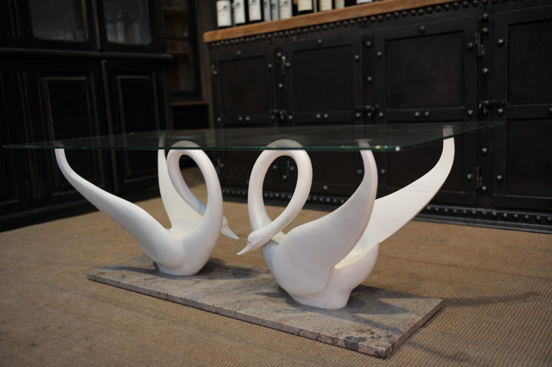 Coffee table by Maison Jansen ( Paris France) circa 1960 with double swan in composite signed Jansen on each side, Marble base and tampered glass top. All in very good condition.