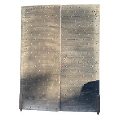 Double swing door in poplar wood with nails, Italy
