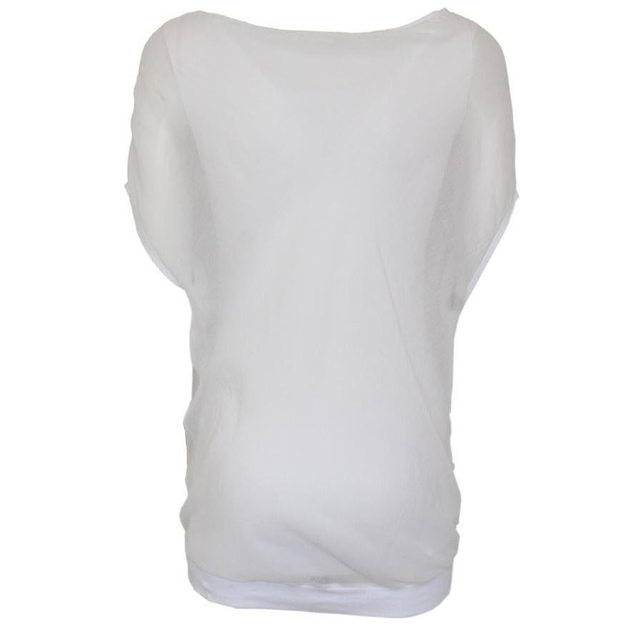 Inner fabric in cotton Outer fabric in silk and cotton White color Short sleeve Lenght from shoulder cm 74 (29.1 inches)
