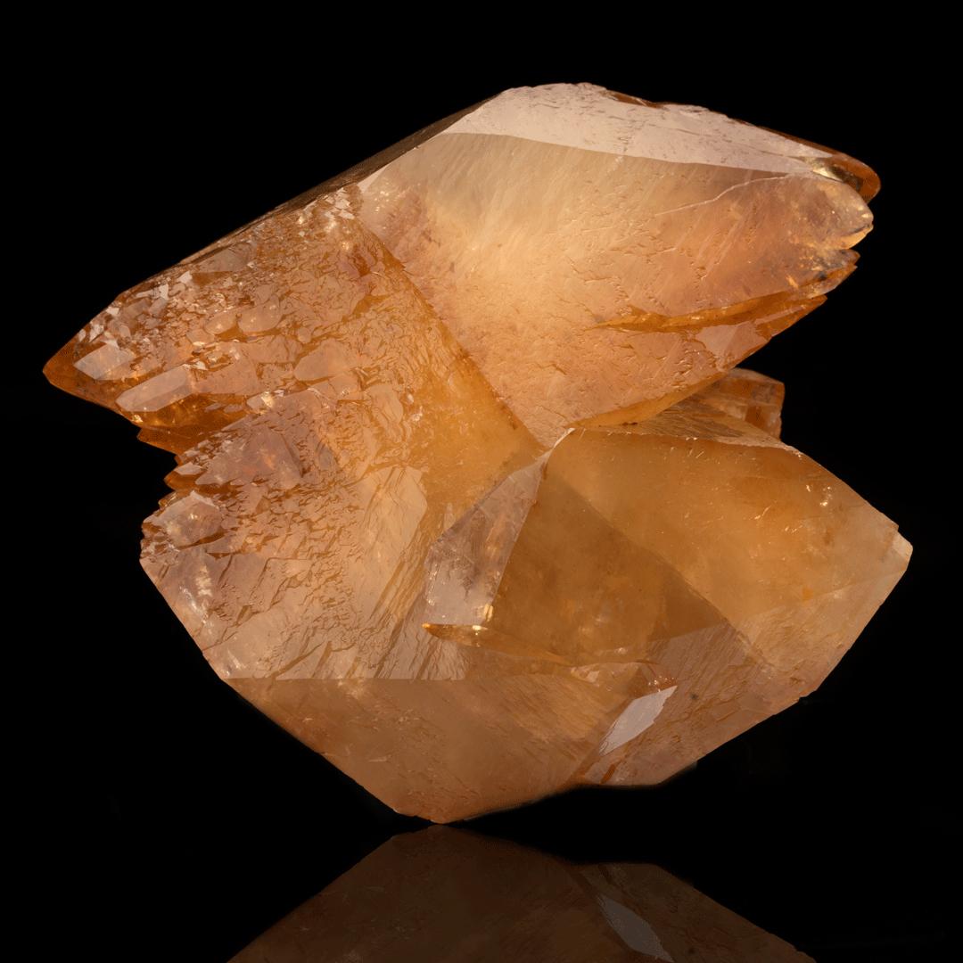 This stunningly gemmy and large calcite crystal is out of the famed Elmwood Mine in Tennessee. Beautifully crystallized and double terminated, it features deep pigmentation and is a prime example of what is considered by many to be the world's