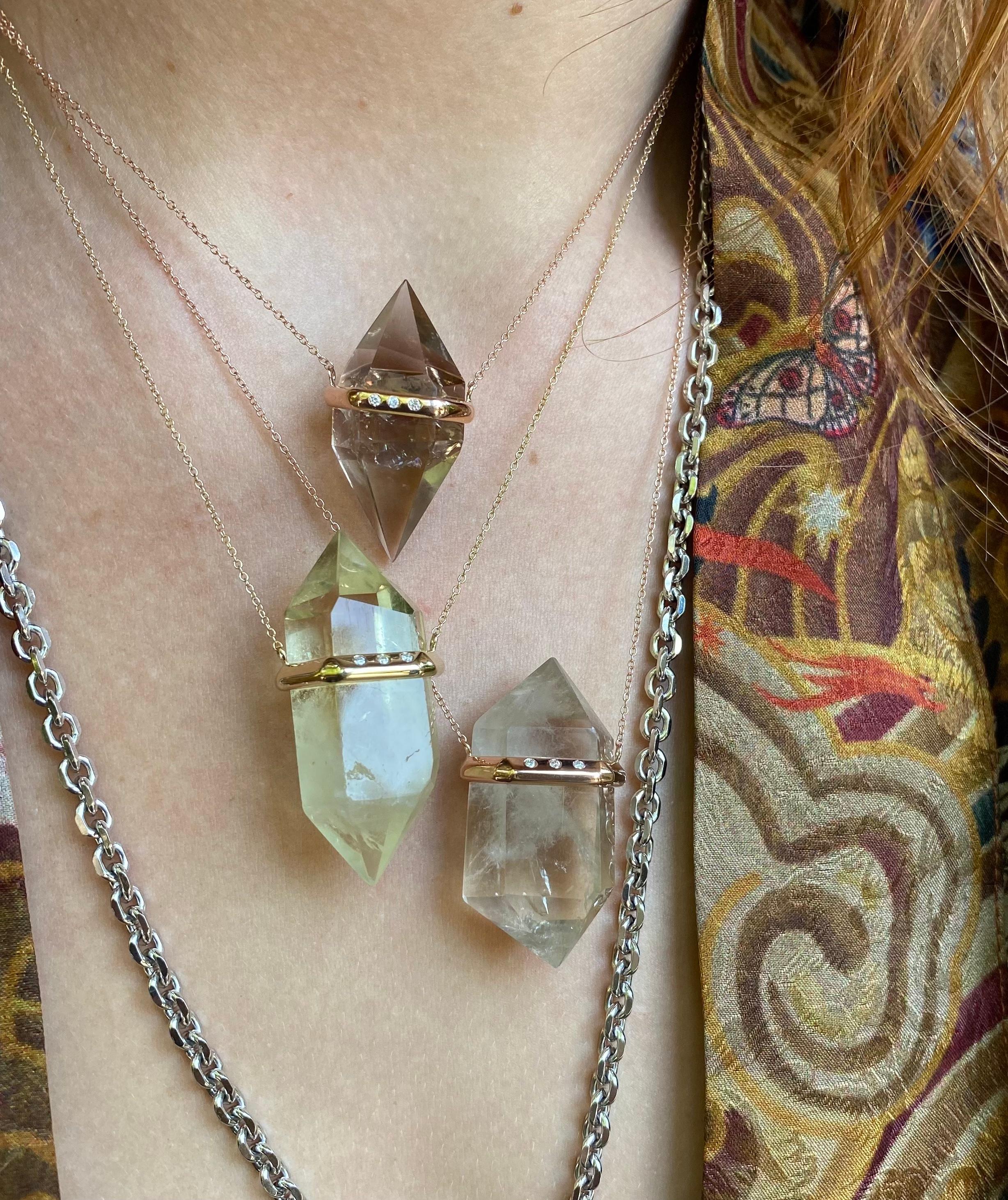 Handmade, one-of-a-kind, double terminated Smokey Quartz Crystal with 3 pave diamonds set in 14k rose gold.

Smokey Quartz Attributes: balance, protection, grounding. 

All House of RAVN Crystals are securely pinned in place. No glue.