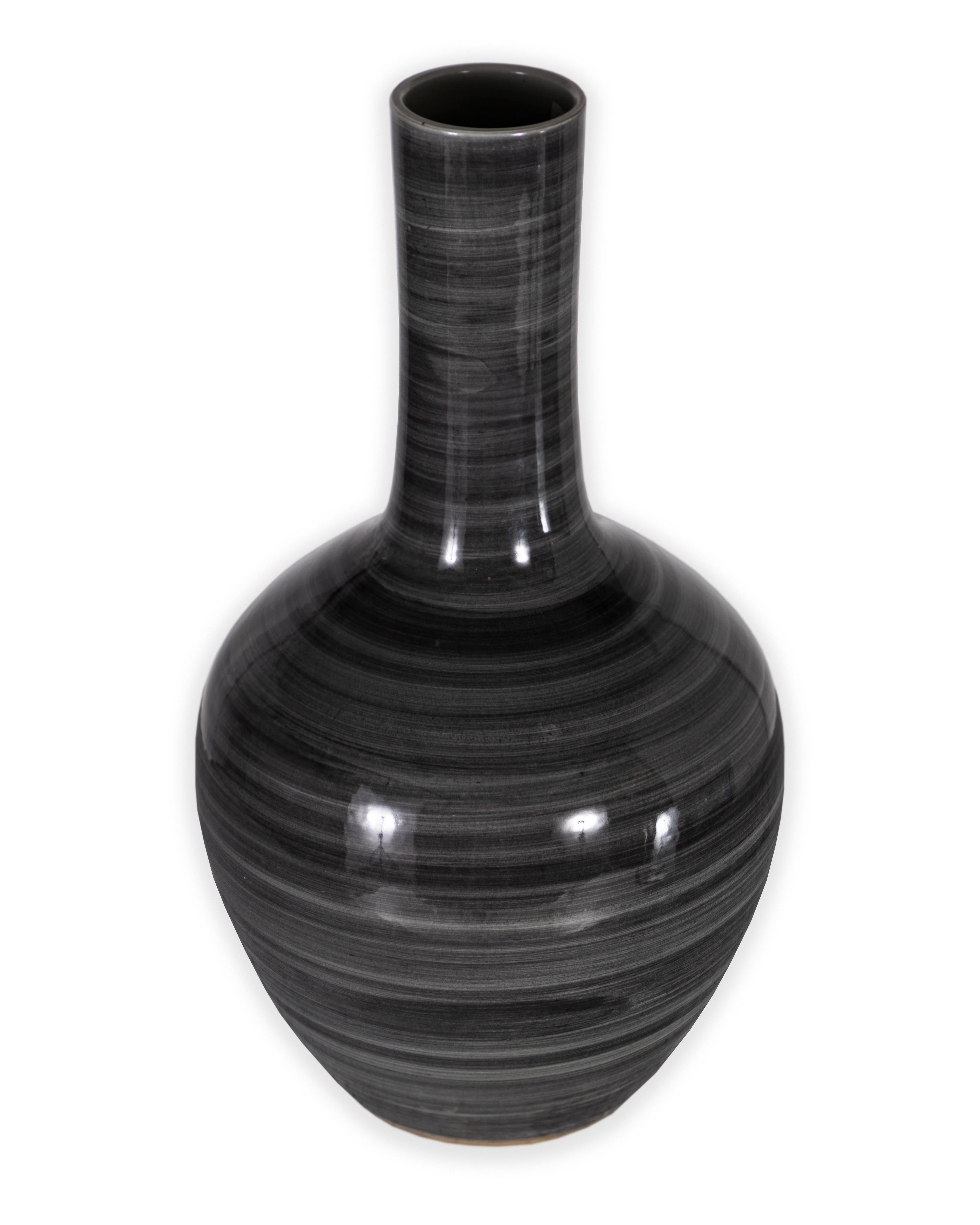 In the style of a Ming globular double wall vase. In a modern grey strié coloring. In my organic, contemporary, vintage and mid-century modern style.

Piece from our one of a kind Le Monde collection.

 