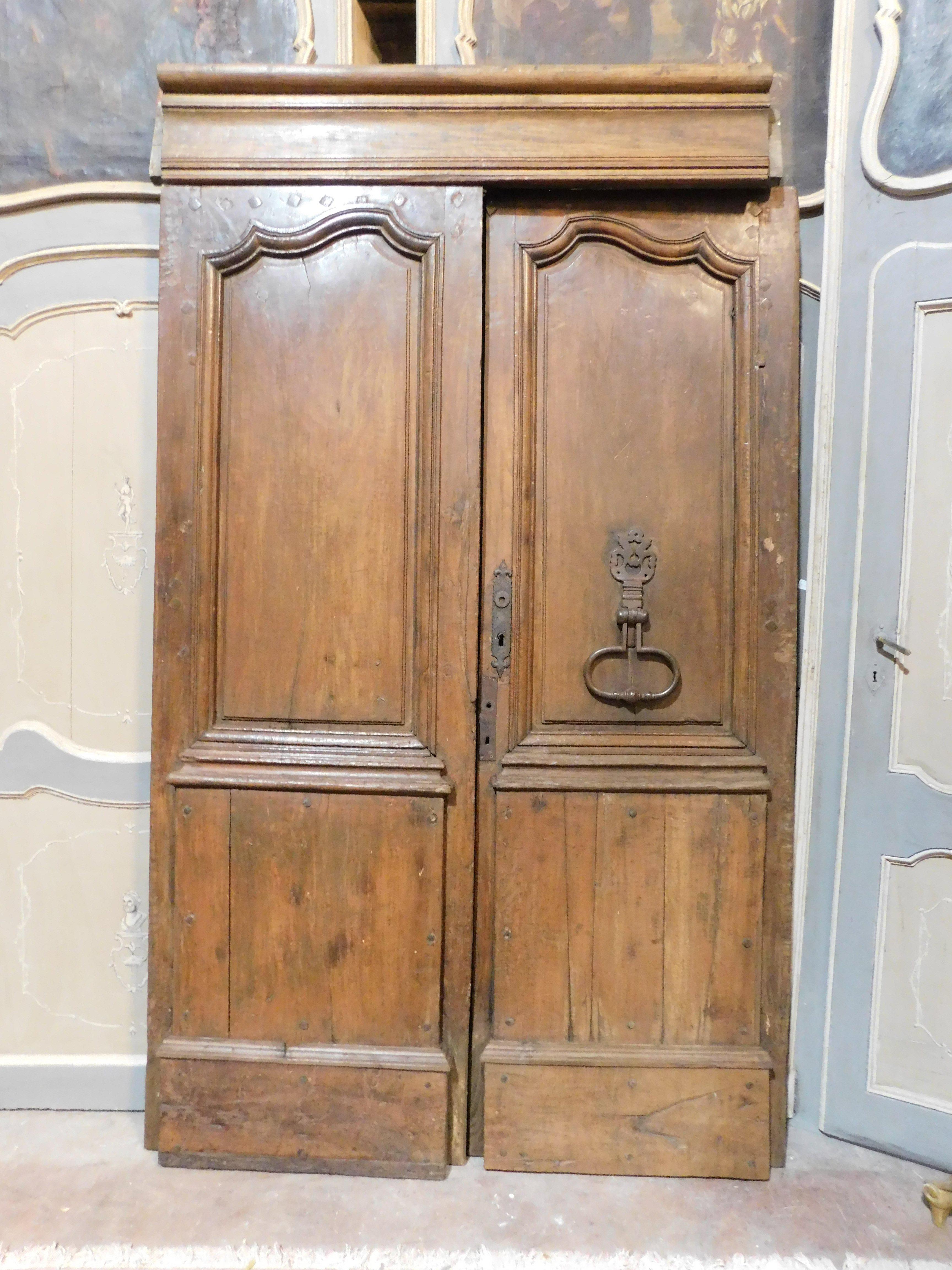 Hand-Carved Double wing entrance main old door, carved in walnut wood with beam, Italy For Sale