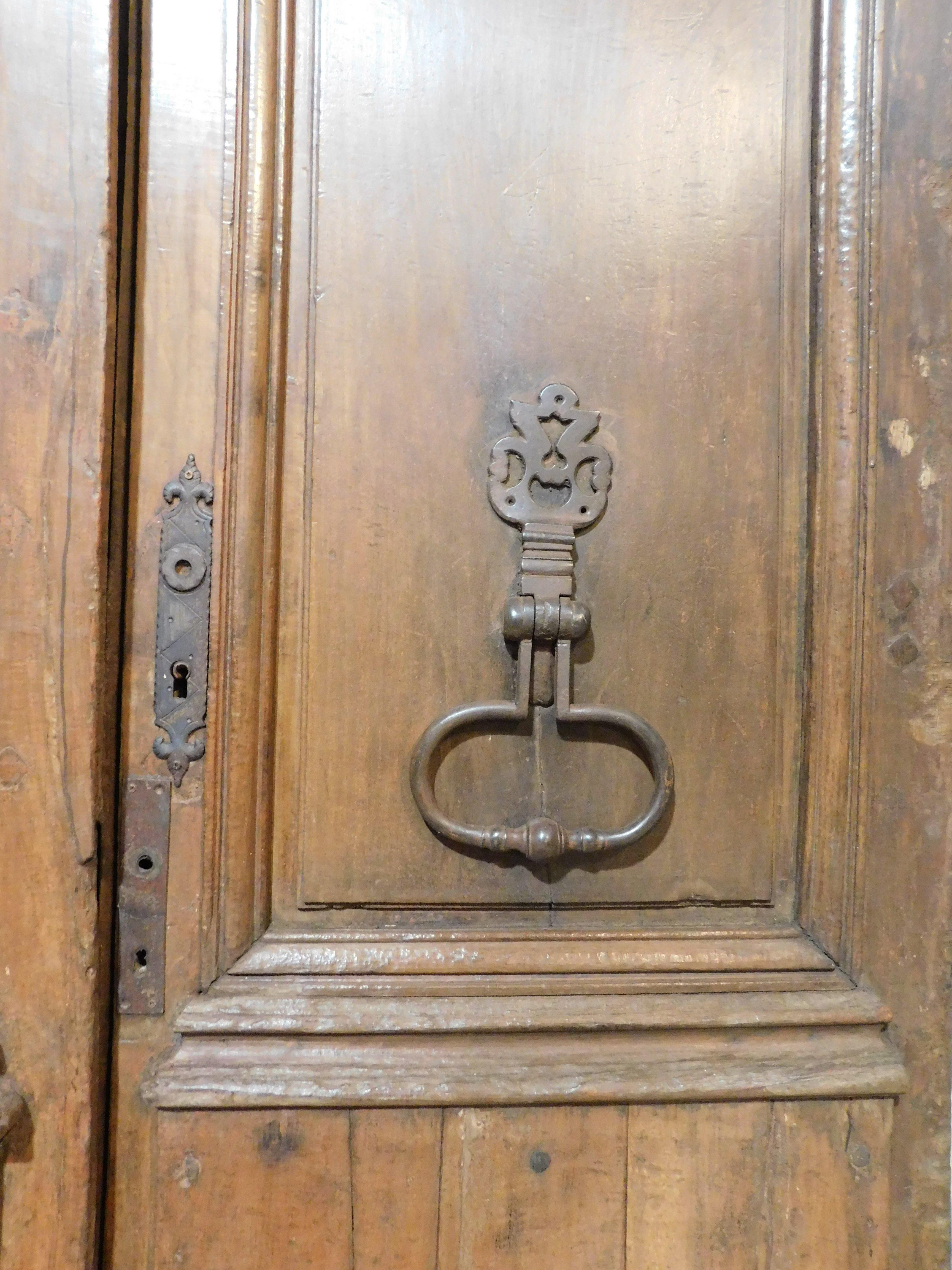18th Century and Earlier Double wing entrance main old door, carved in walnut wood with beam, Italy For Sale