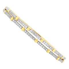 Bracelet à double enveloppe en or jaune et blanc avec diamants
