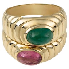 Anello doppio in oro giallo con tormalina e smeraldo