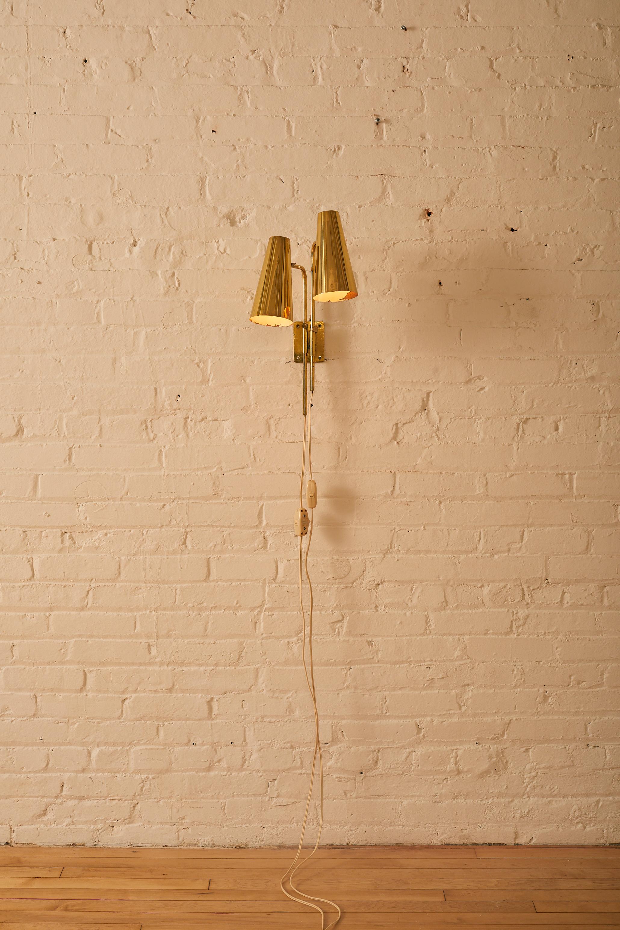 Double Headed Wall Sconce by  Paavo Tynell

About Paavo Tynell: 

Paavo Tynell (1890-1973) was an industrial designer, known as the great pioneer of Finnish lighting design and fondly dubbed as “the man who illuminated Finland”. Tyne was one of the