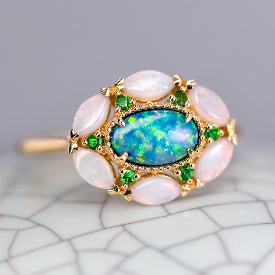 Australian Doublet Opal Marquise White Opal Tsavorite Engagement Wedding Ring 18K Yellow Gold.


Free Domestic USPS First Class Shipping! Free Gift Bag or Box with every order!

Opal—the queen of gemstones, is one of the most beautiful gemstones in