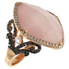 Ring aus 18 Karat Roségold mit 14,1 Karat rosa Opalquarz und Diamant