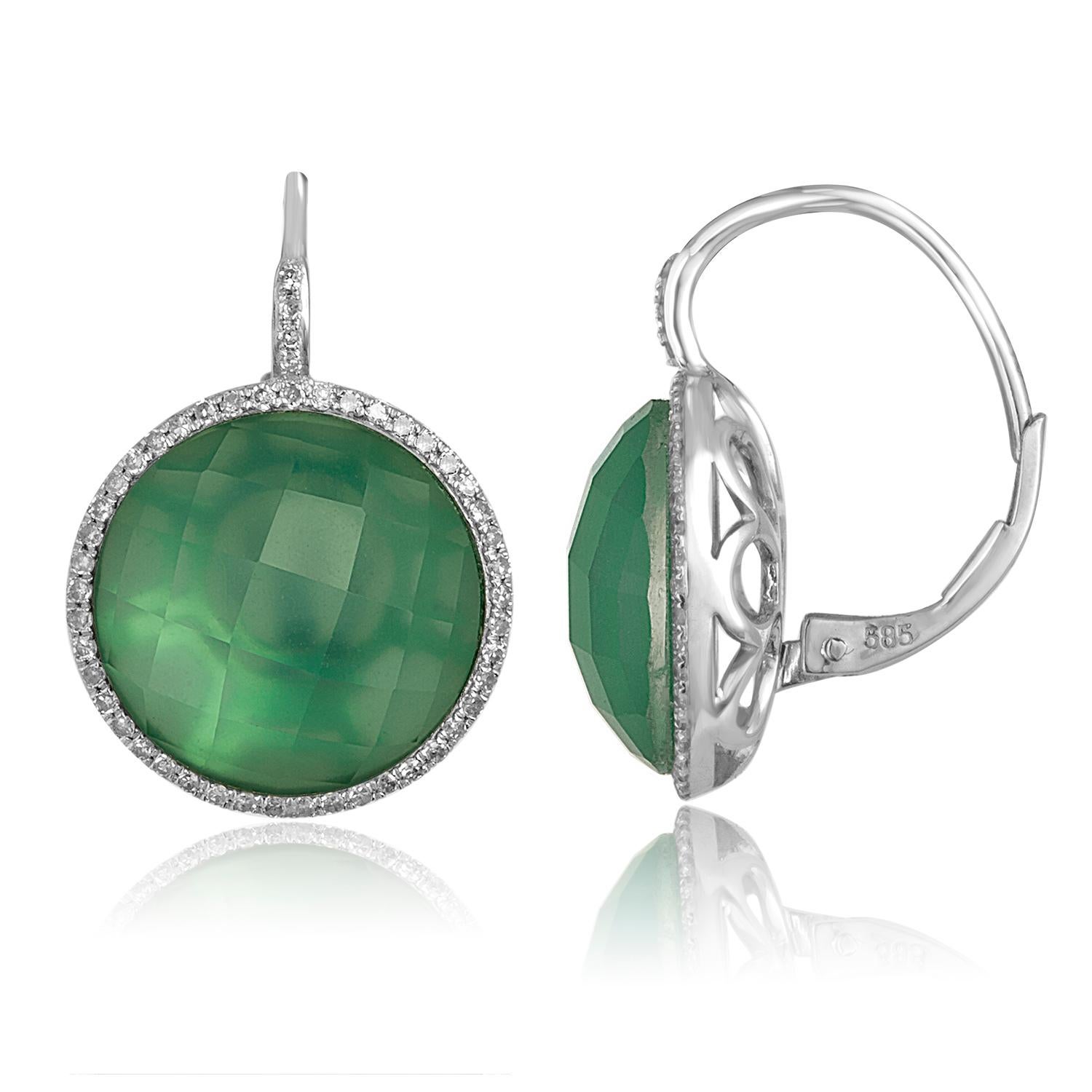 Sliced to display their natural variations in character.
The green agate slice is topped with clear faceted white topaz.
The slices are set in 14K White Gold and surrounded by Diamonds.
There are 0.29ct in Diamonds H/I SI.
There are 9.23ct in White