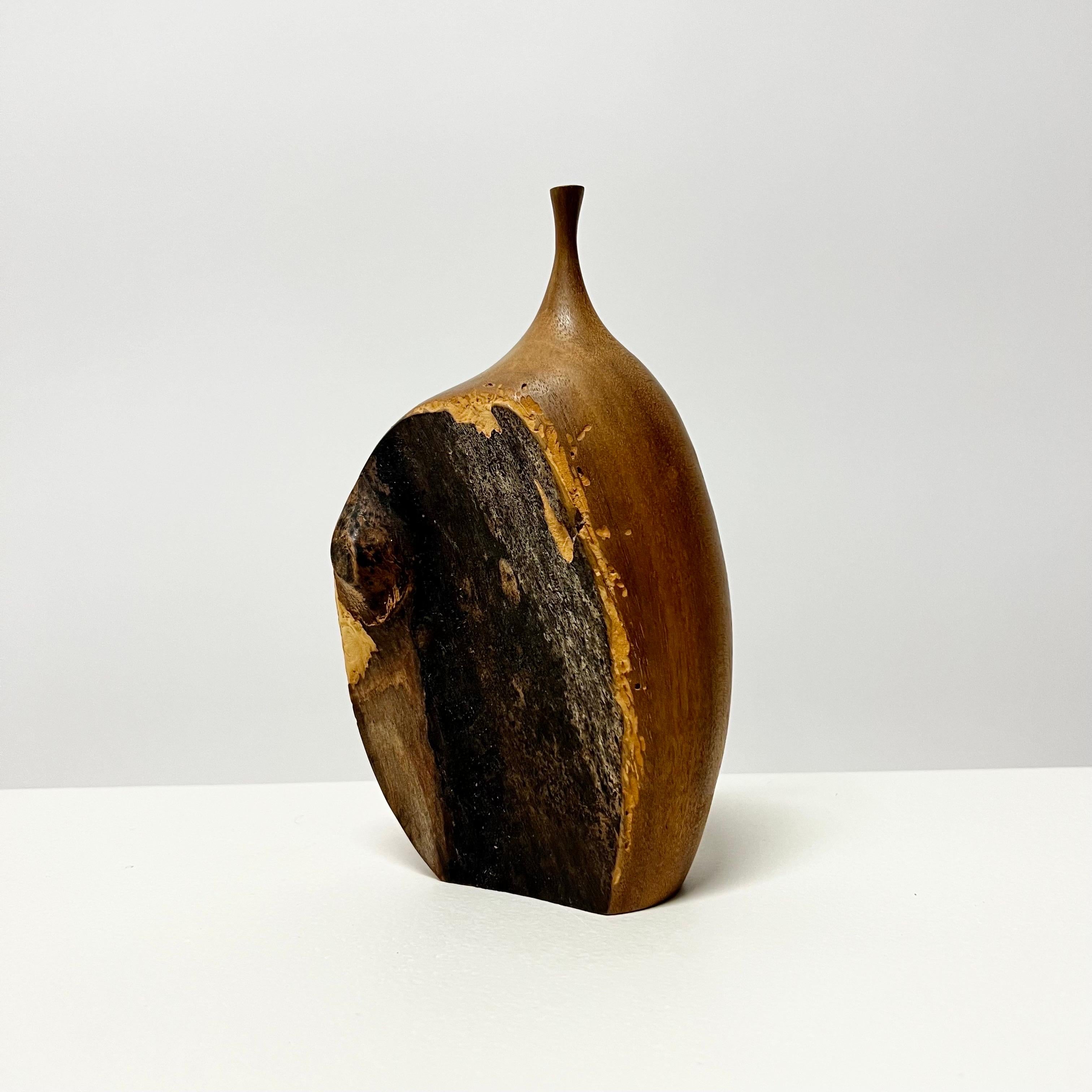 Stunning live edge black walnut vase by noted California studio artist, Doug Ayers. Signed and dated.