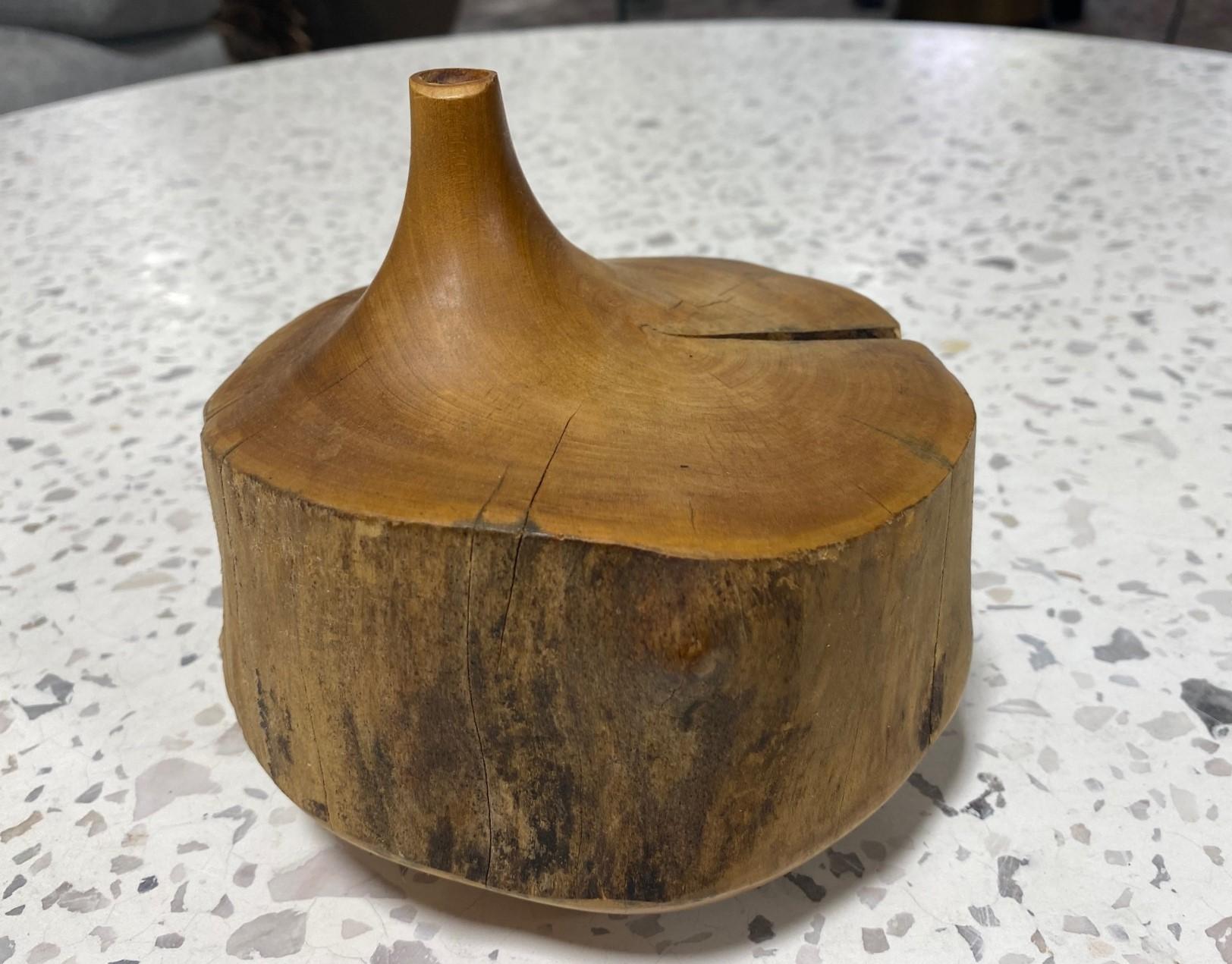 A very beautifully made, organic natural wood-turned weed vase by famed American / California (Mendocino, CA) artist/ sculptor Doug Ayers.  This work has such a great heft and texture to it.  Wonderfully designed.  

Signed by Ayers on the