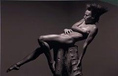 Diagonal Lift - Nude Female Balanced on a Pedestal, Black and White Photograph 