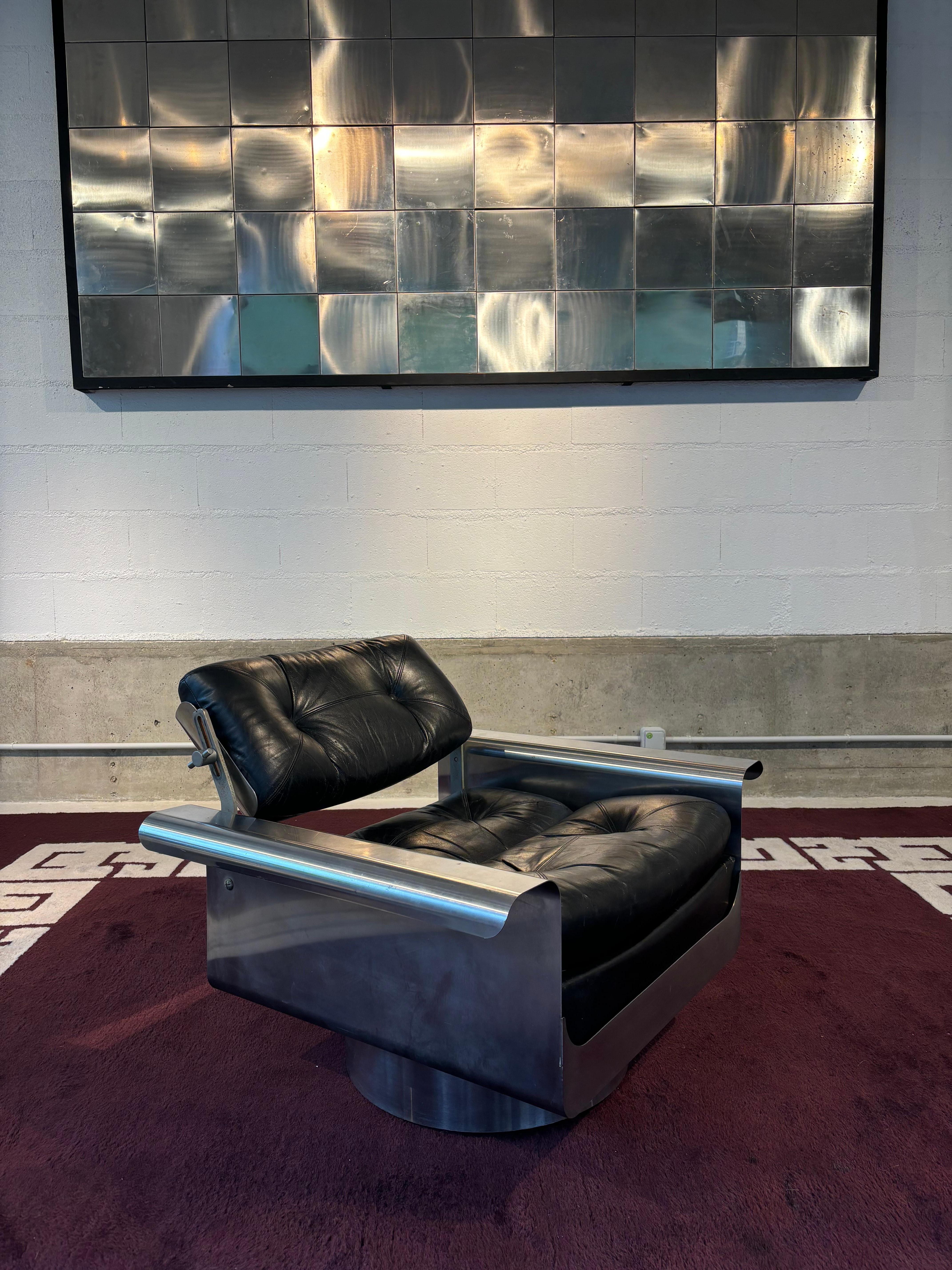 One of the rarest armchair from the 1970´s by Pierre Folie for the Jacques Charpentier edition. This iconic armchair in stainless steel and leather is in perfect conditon
