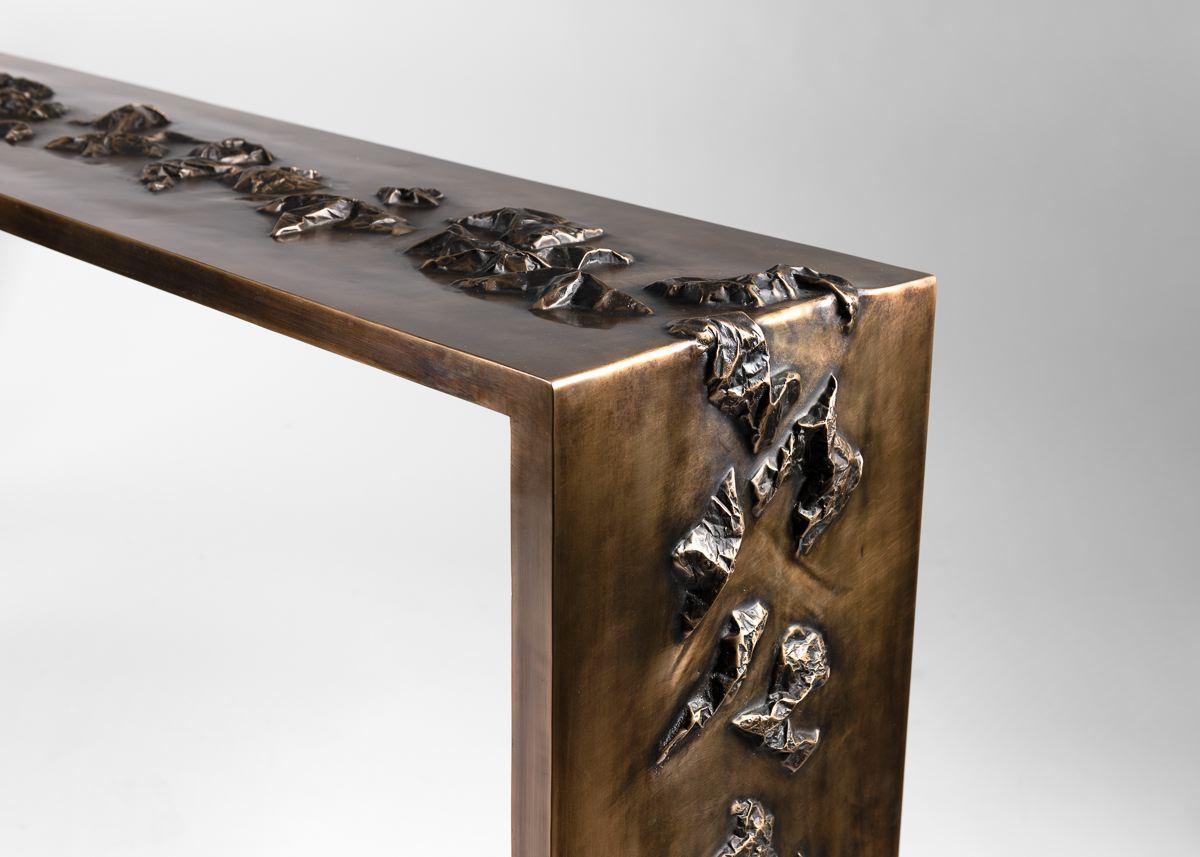 Master metalsmith Douglas Fanning's extra long console features an extended series of topographical crests spanning two thirds of its otherwise smooth top and spilling over onto one side. Fanning, always eager to explore new territories in form and