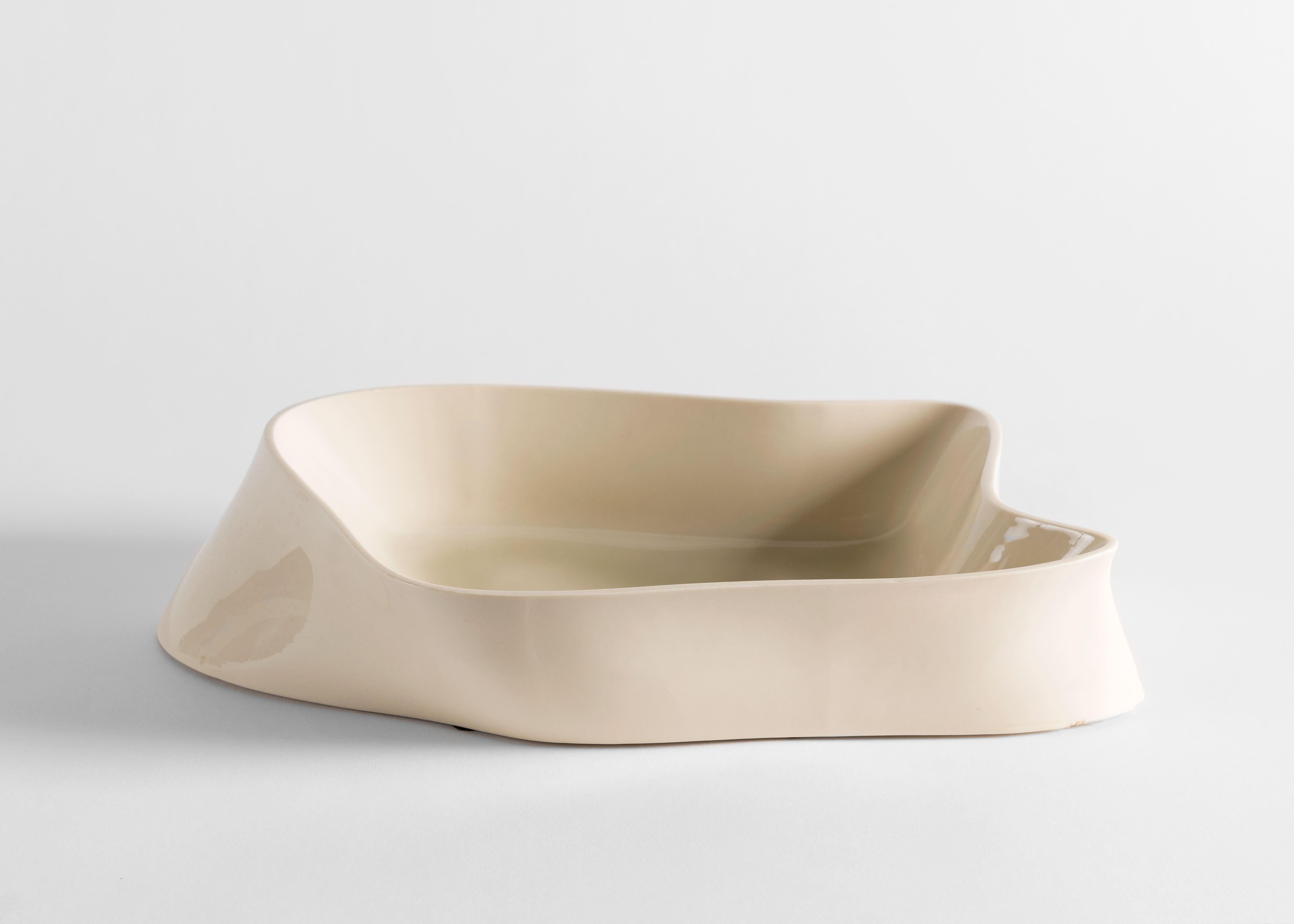 A vessel extraordinary not merely for its milky glaze and consummate utility, but its impressive amorphous shape. With the vessel's form Fanning has solidified a shape typically ephemeral and practically singular to liquids.